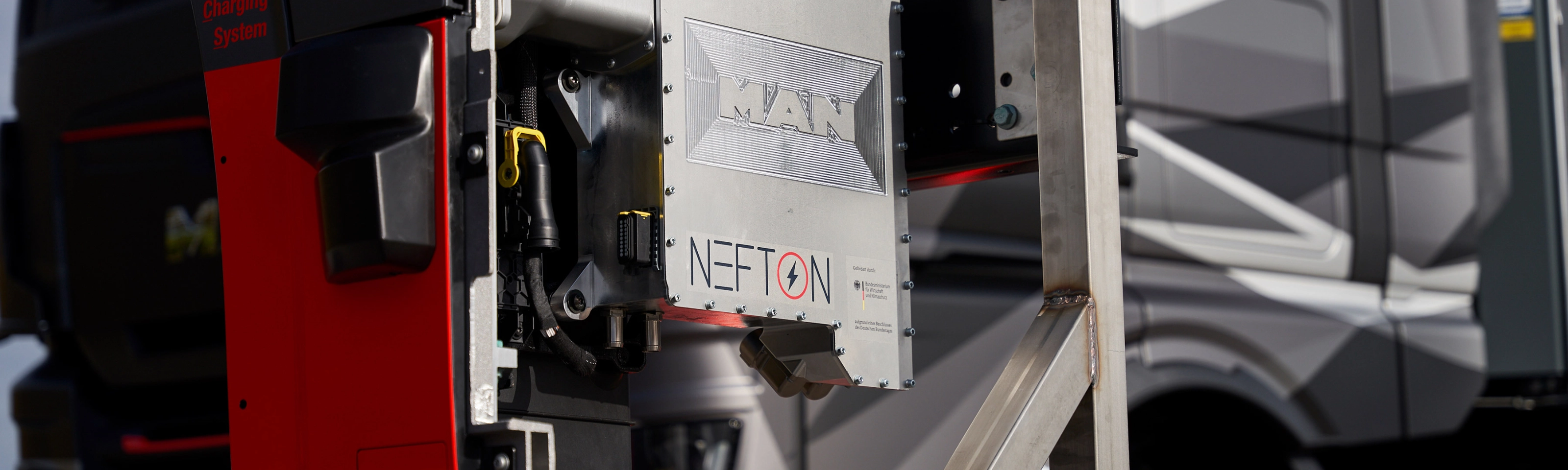 MAN Nefton megawatt charging system mounted in front of an electric truck.