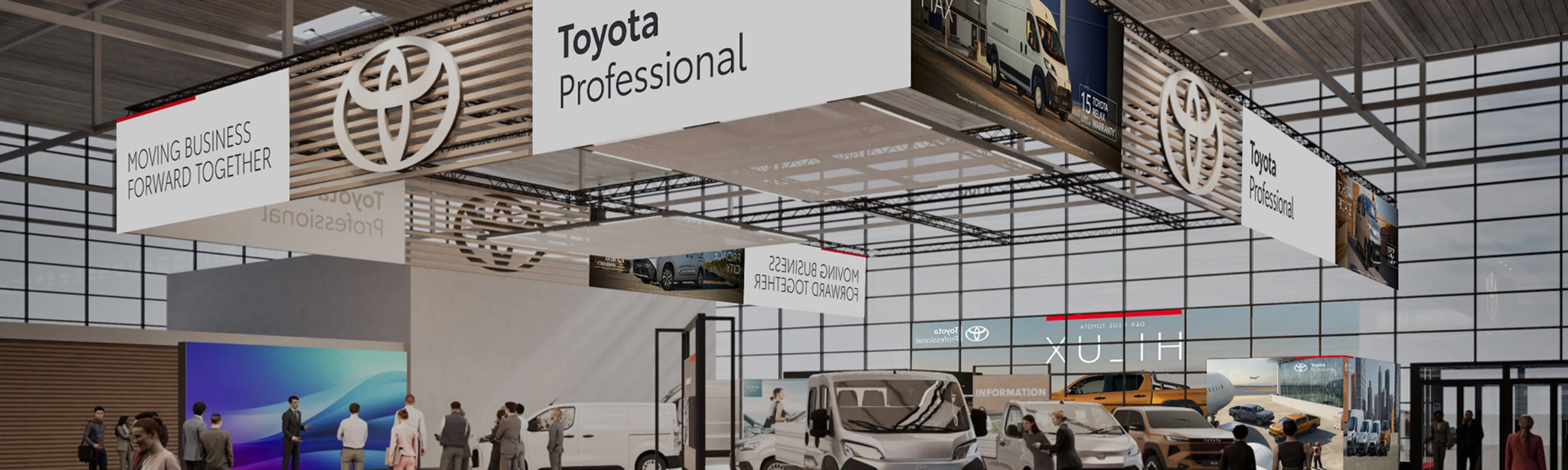 Toyota Professional exhibition stand with commercial vehicles and visitors at a trade fair.