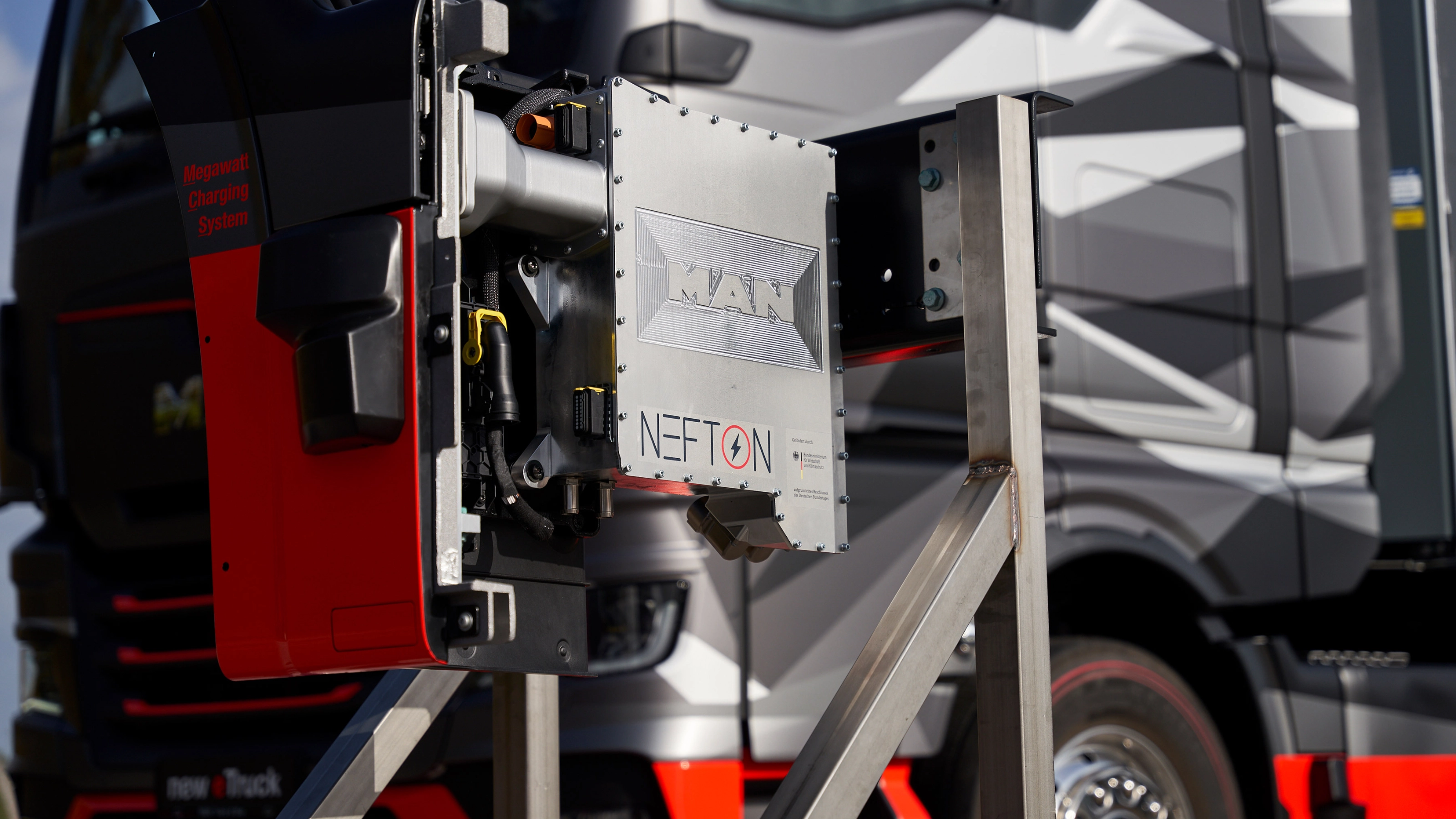 MAN Nefton megawatt charging system mounted in front of an electric truck.