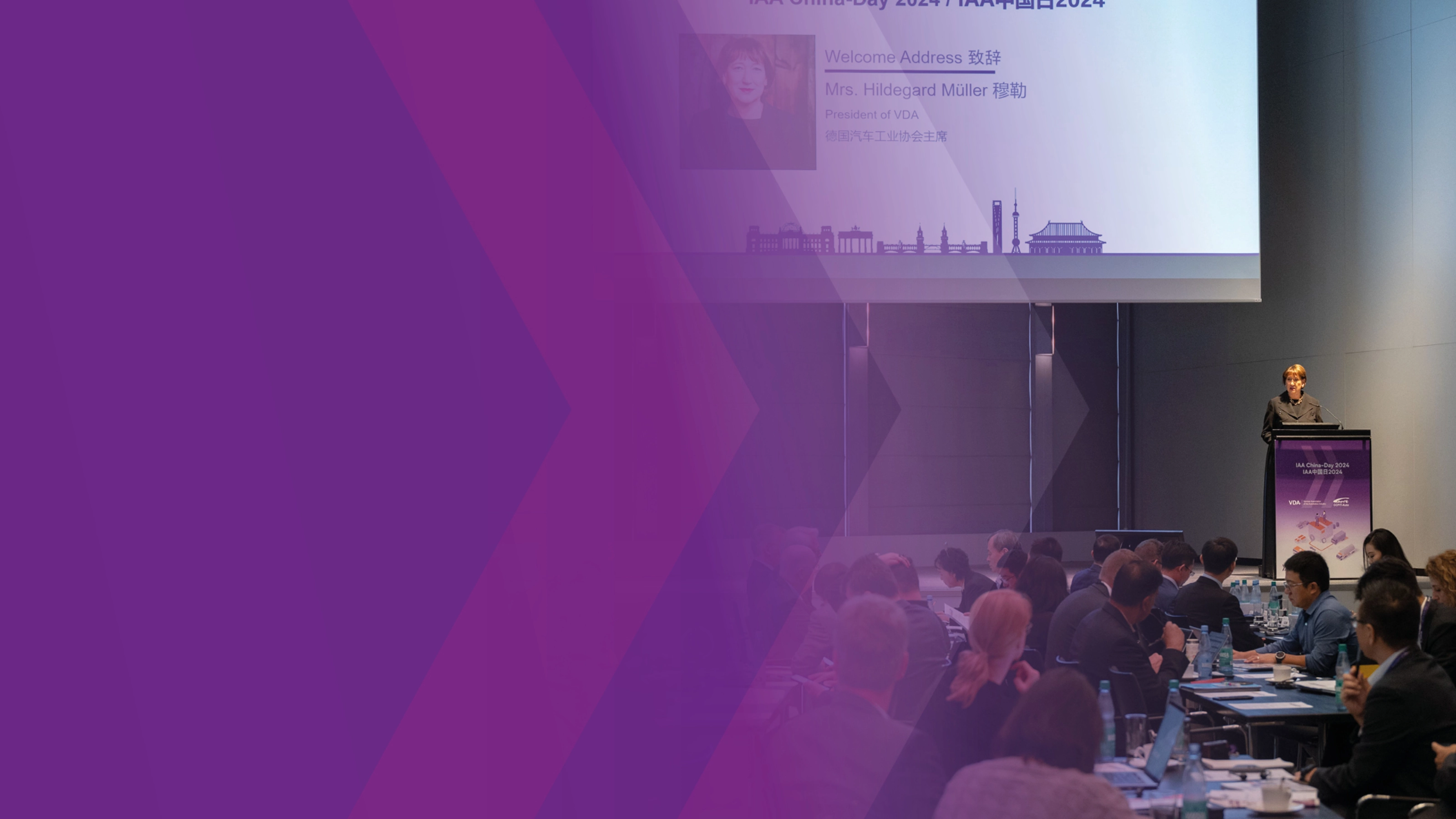 Hildegard Müller speaks at a podium during IAA China Day 2024 conference.