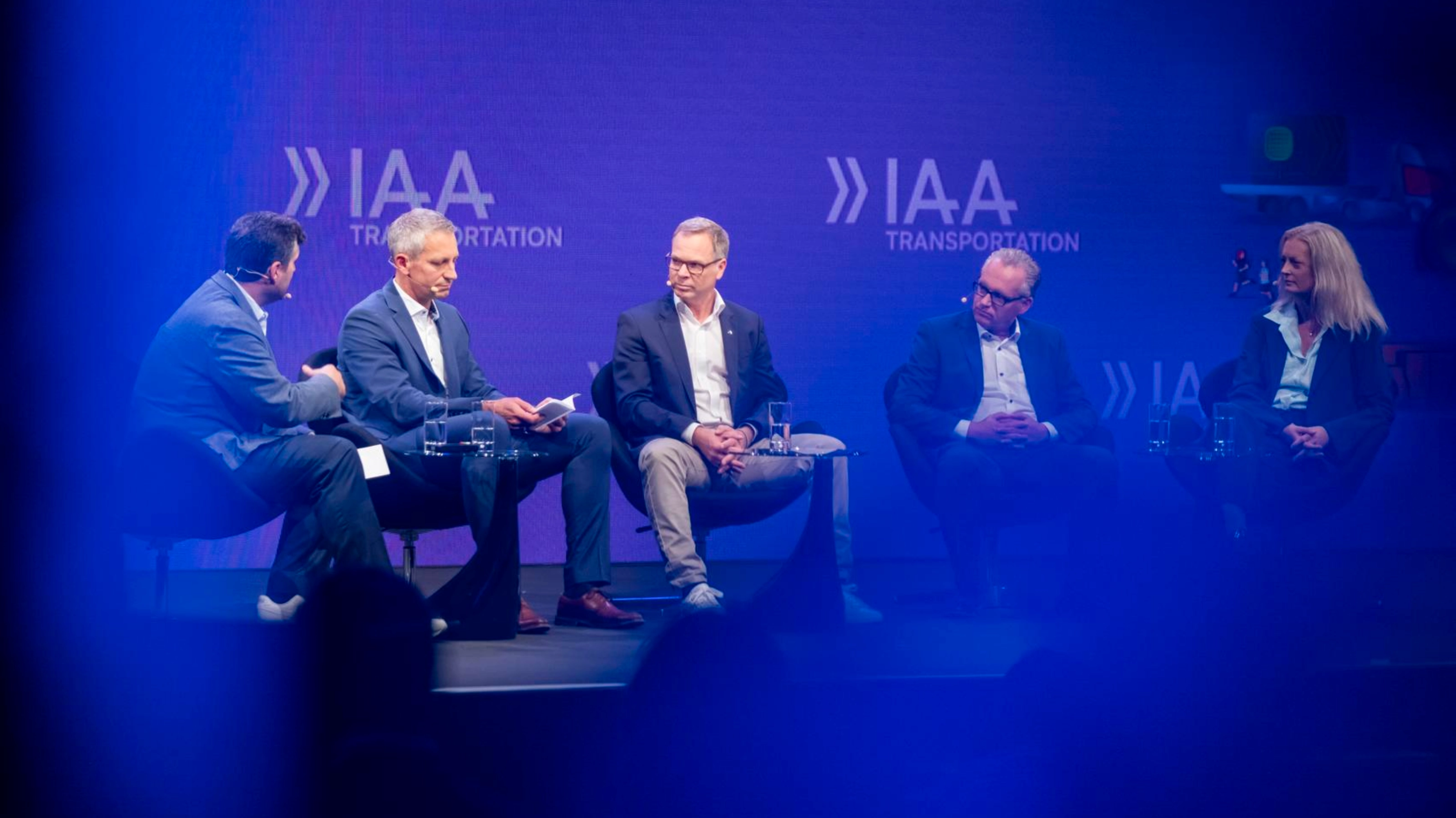 Five participants discuss on stage at IAA Transportation.