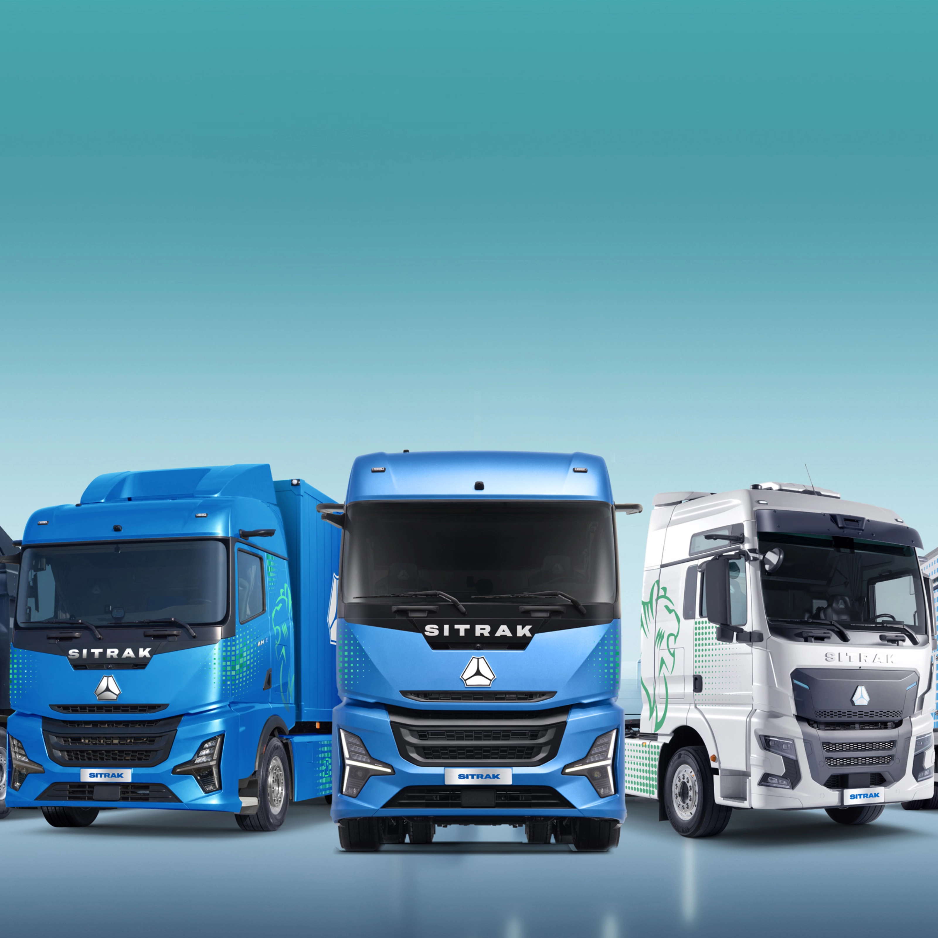 Five SITRAK trucks of different sizes displayed side by side.