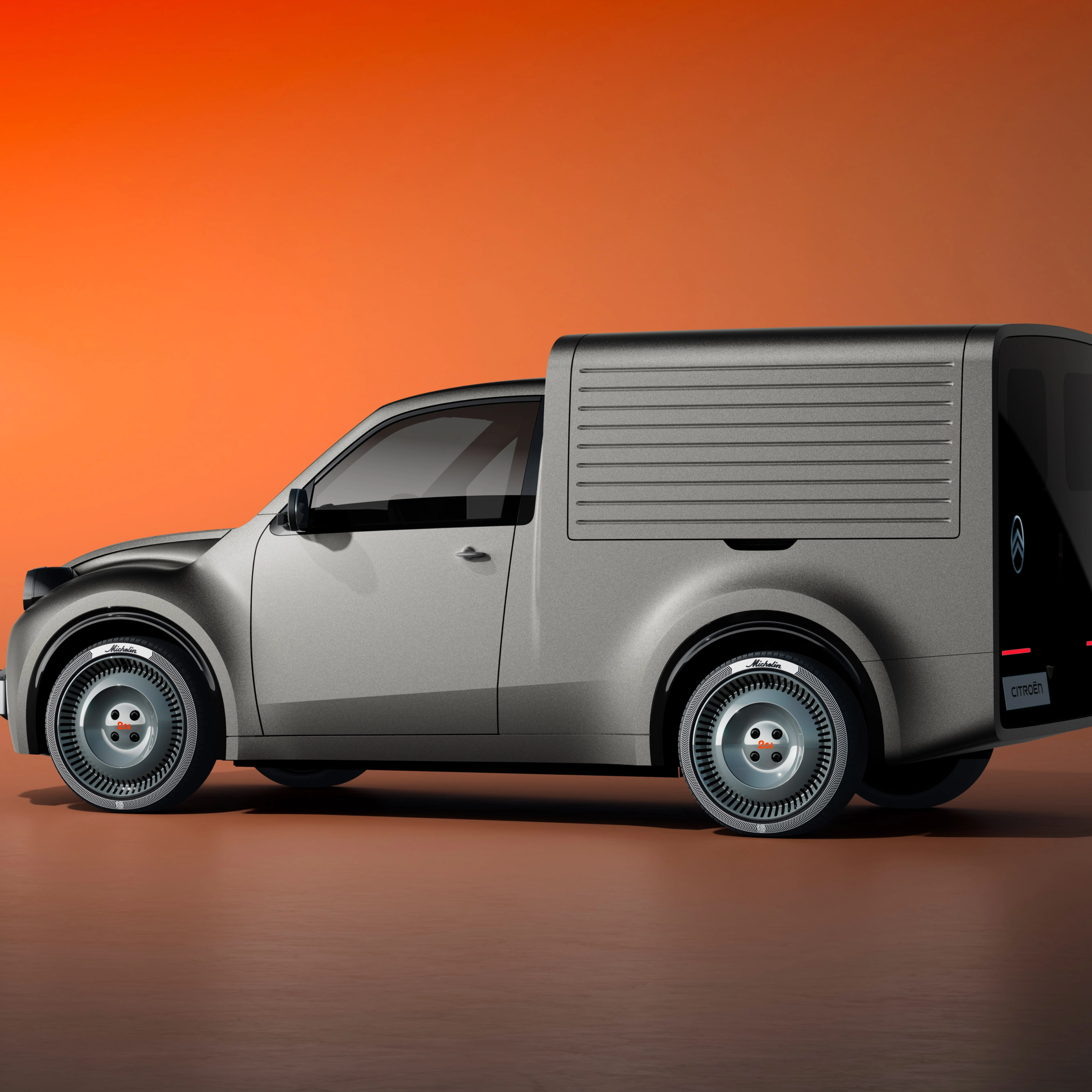 White Citroën delivery van in side view against an orange background.