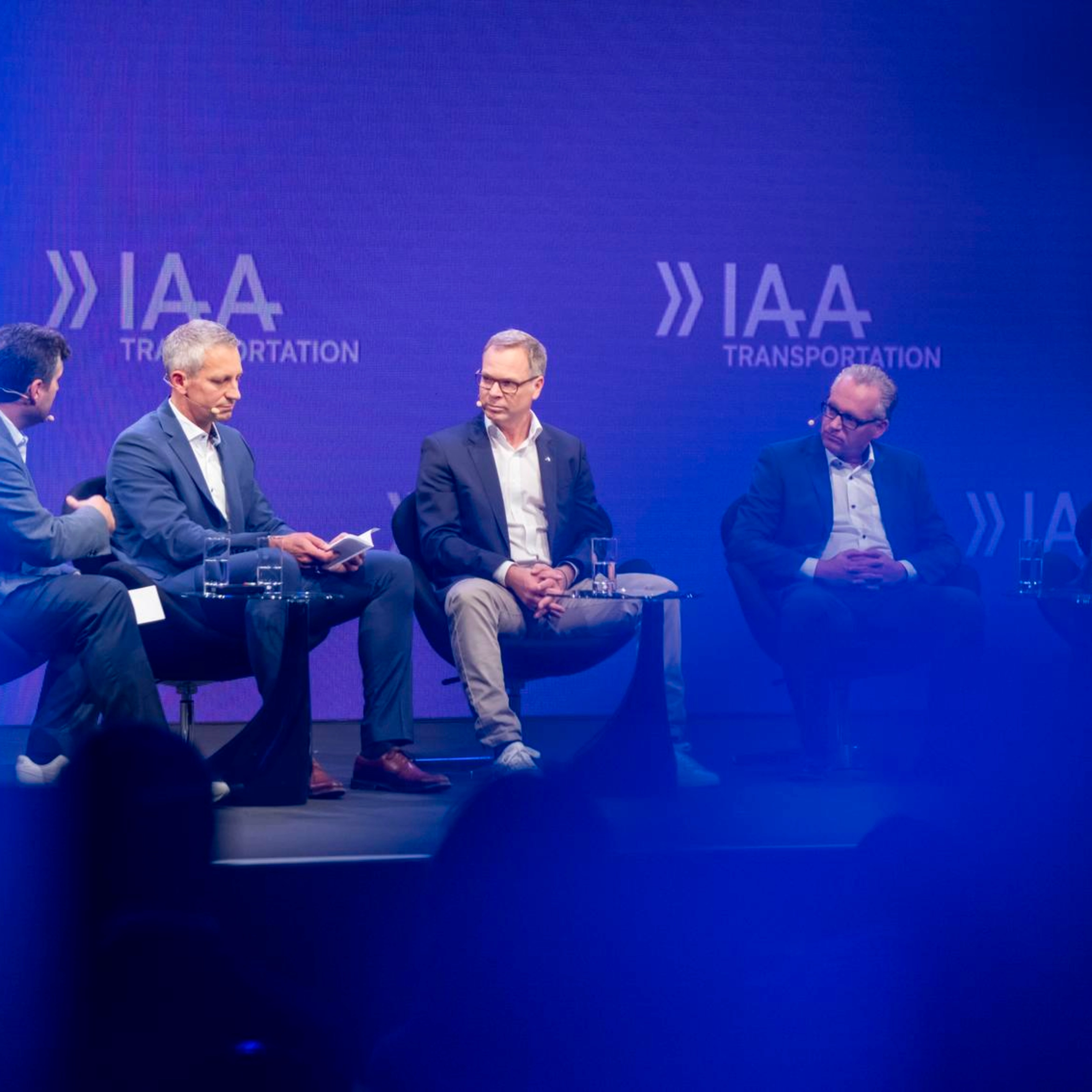 Five participants discuss on stage at IAA Transportation.