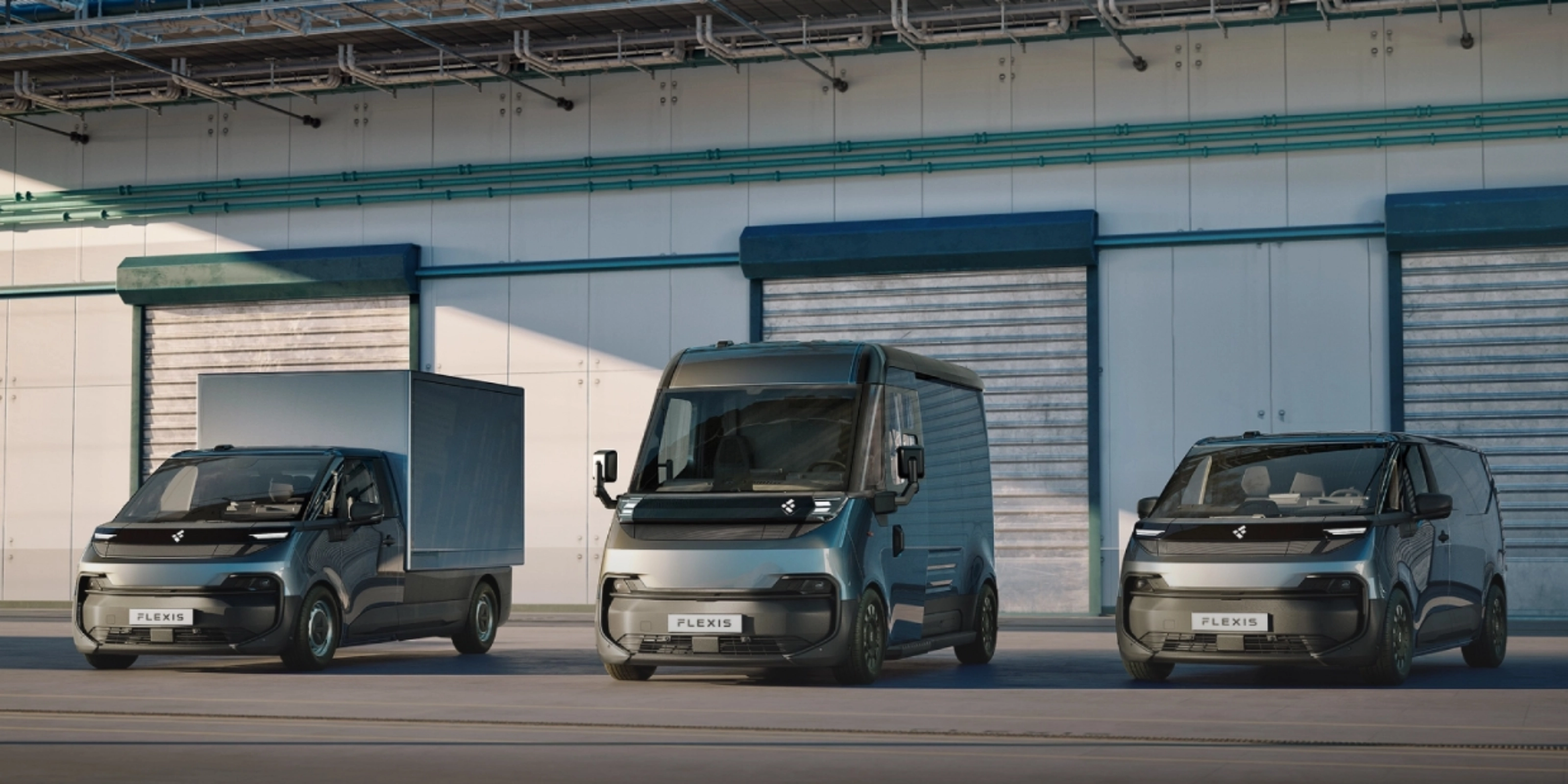 Three FLEXIS electric delivery vans parked in front of a warehouse.