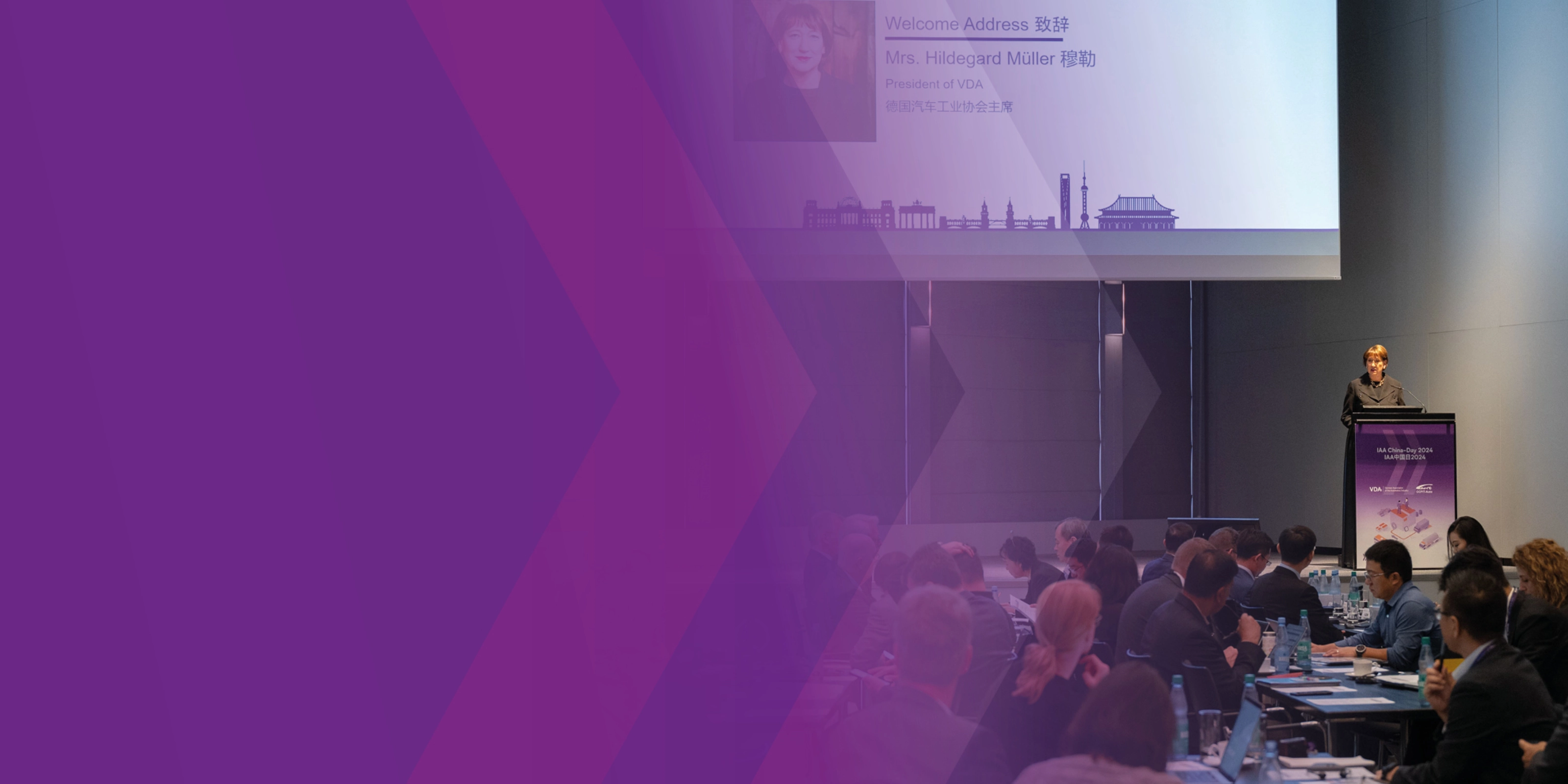 Hildegard Müller speaks at a podium during IAA China Day 2024 conference.