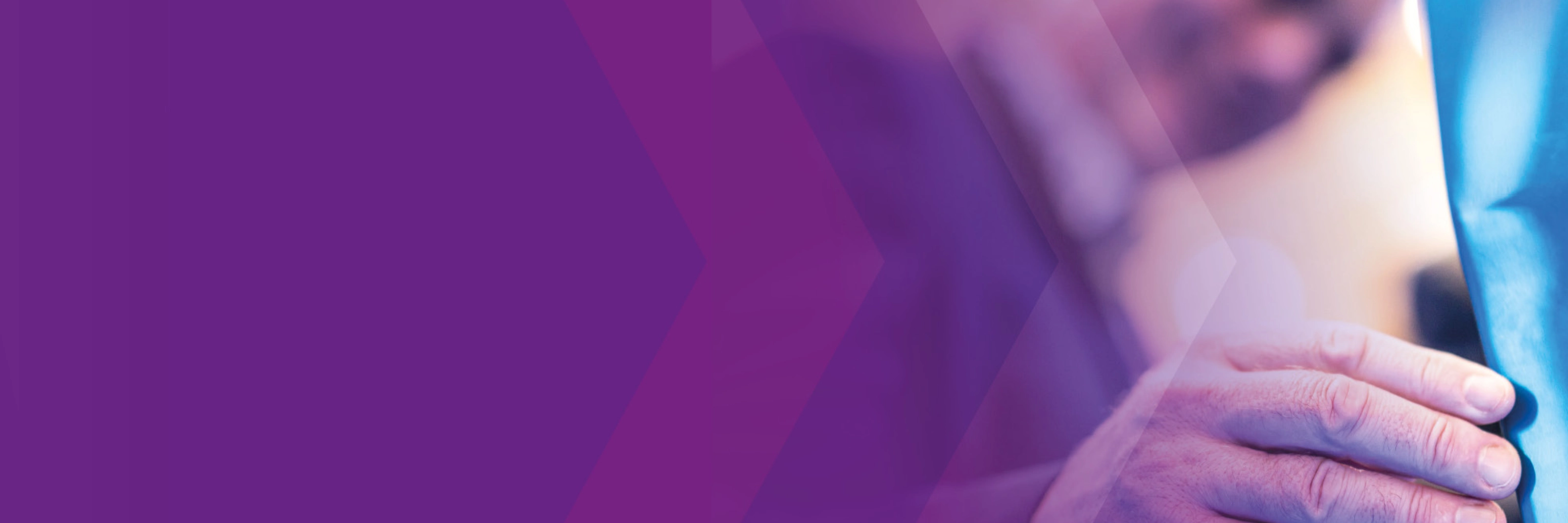 Man touching a vehicle component, purple overlay on the left.