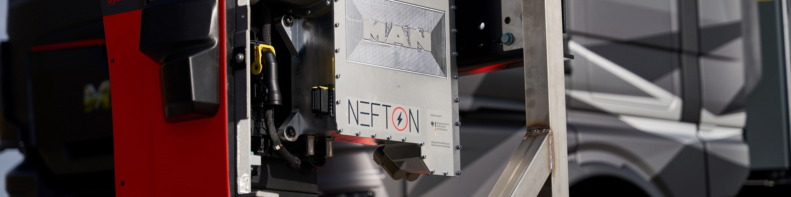 MAN Nefton megawatt charging system mounted in front of an electric truck.