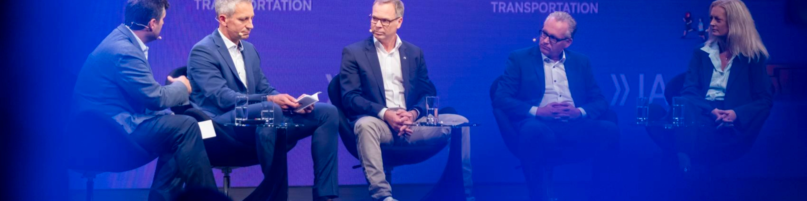 Five participants discuss on stage at IAA Transportation.