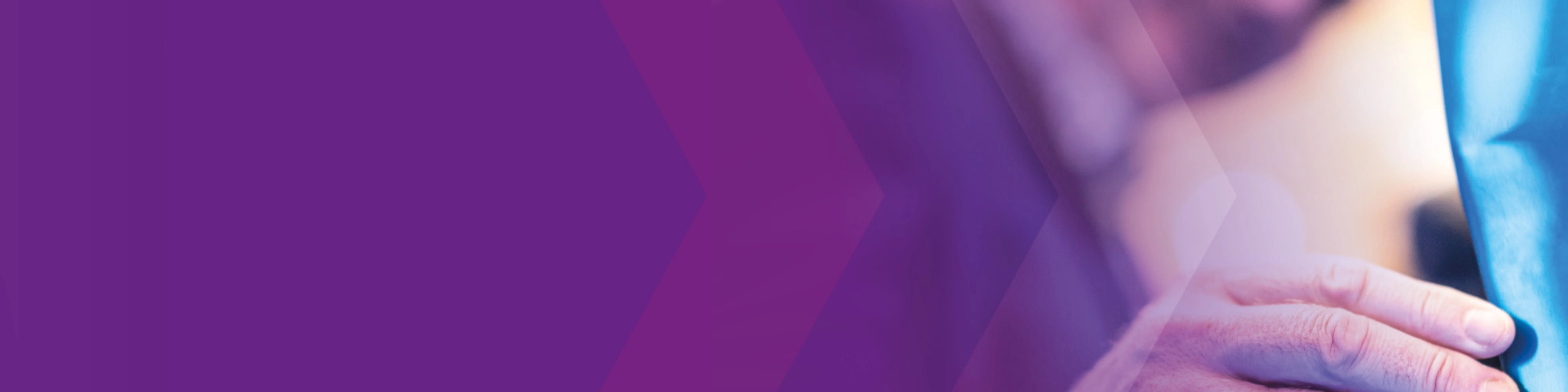 Man touching a vehicle component, purple overlay on the left.