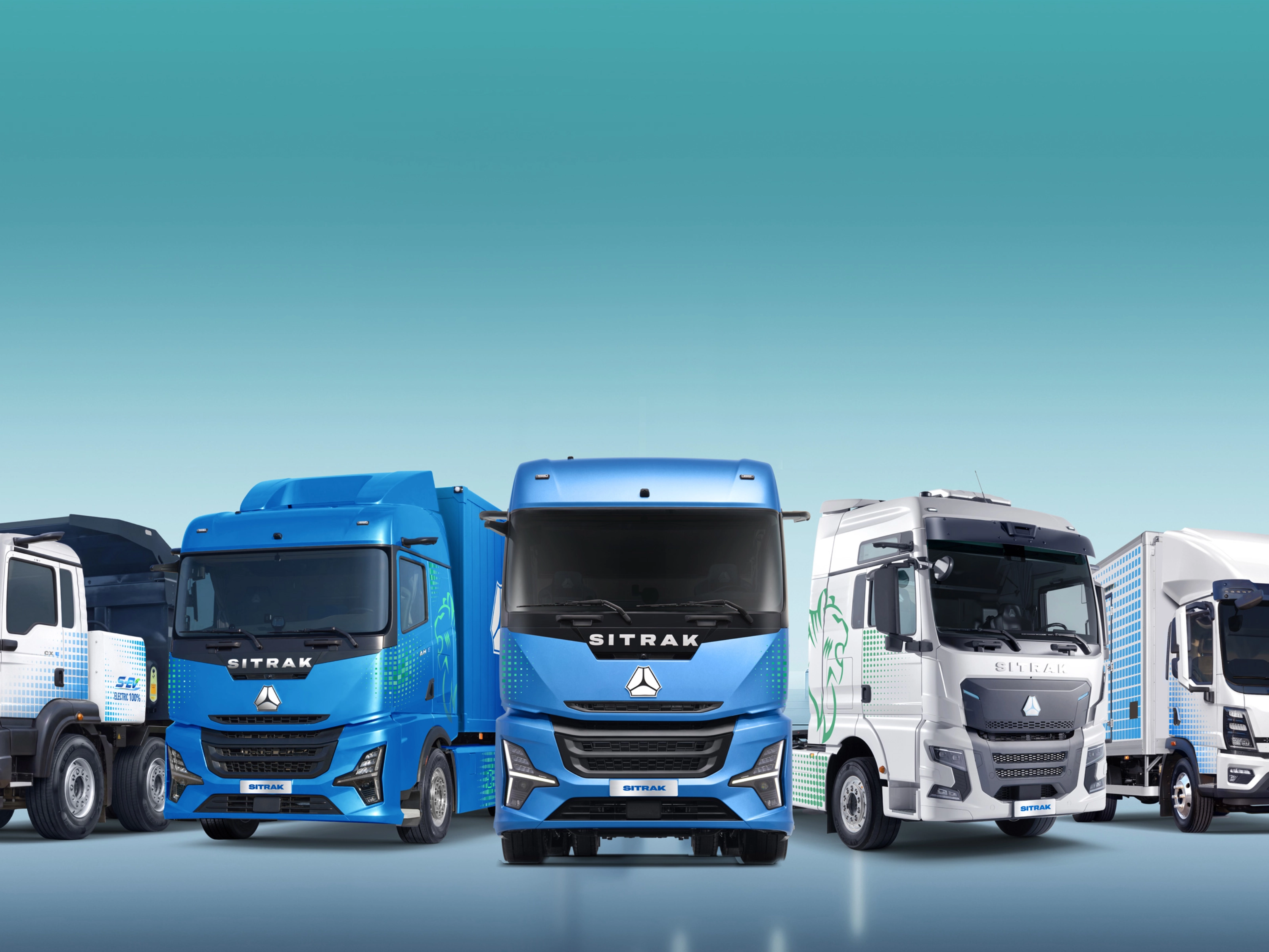 Five SITRAK trucks of different sizes displayed side by side.