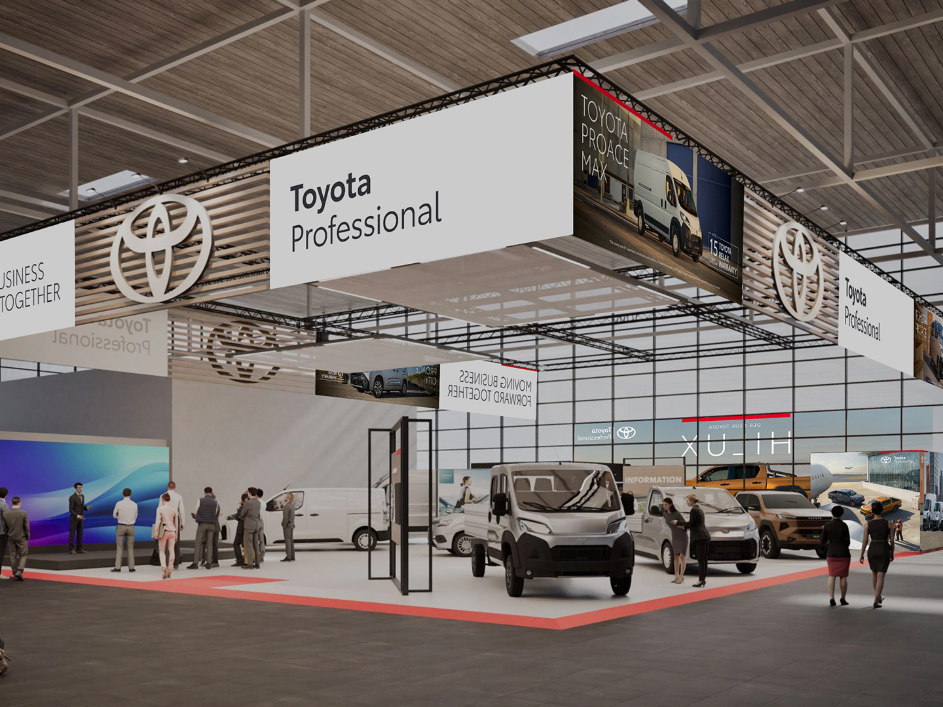 Toyota Professional exhibition stand with commercial vehicles and visitors at a trade fair.