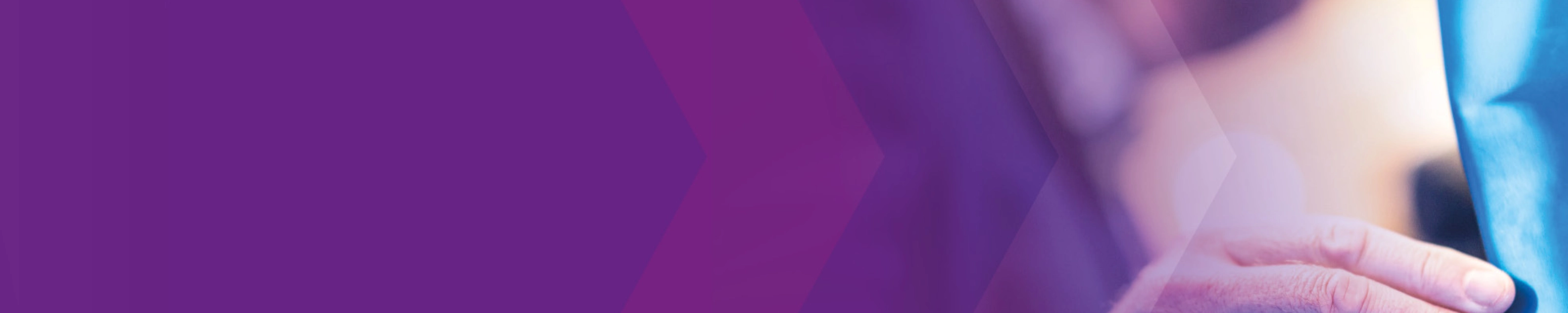 Man touching a vehicle component, purple overlay on the left.