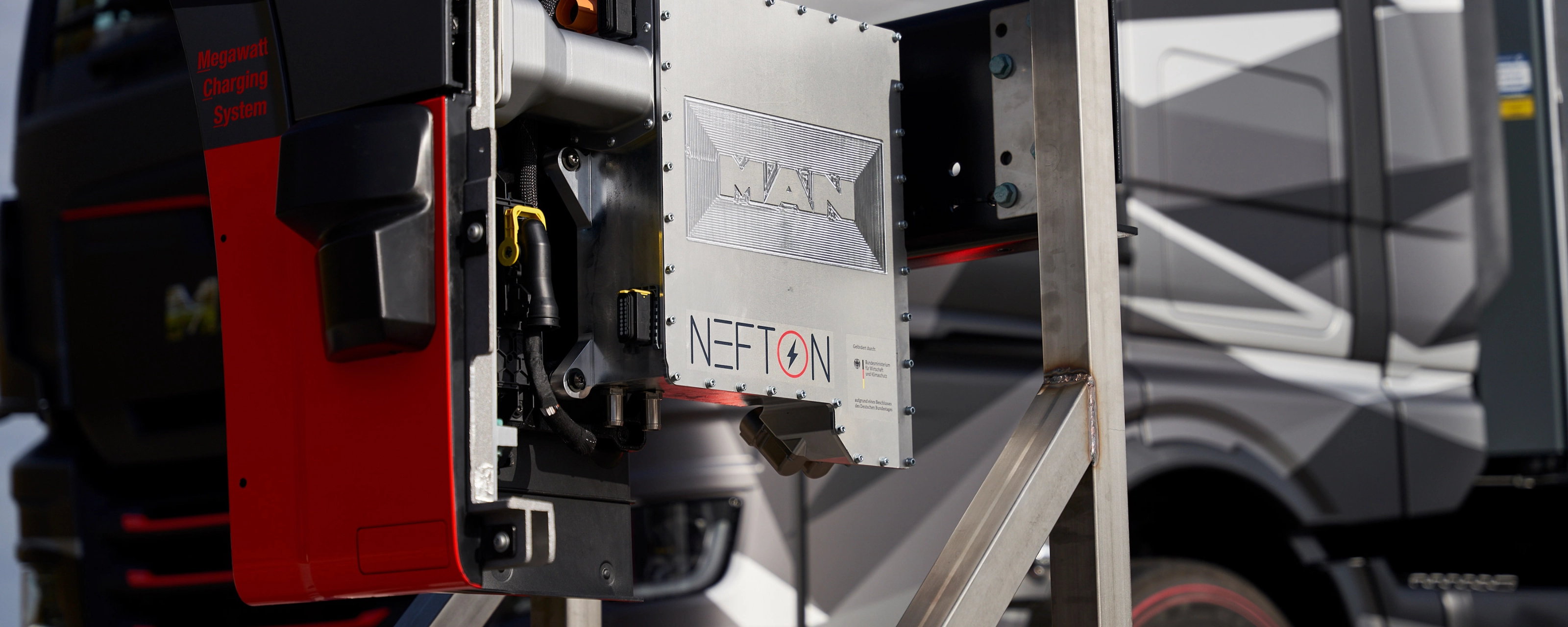 MAN Nefton megawatt charging system mounted in front of an electric truck.