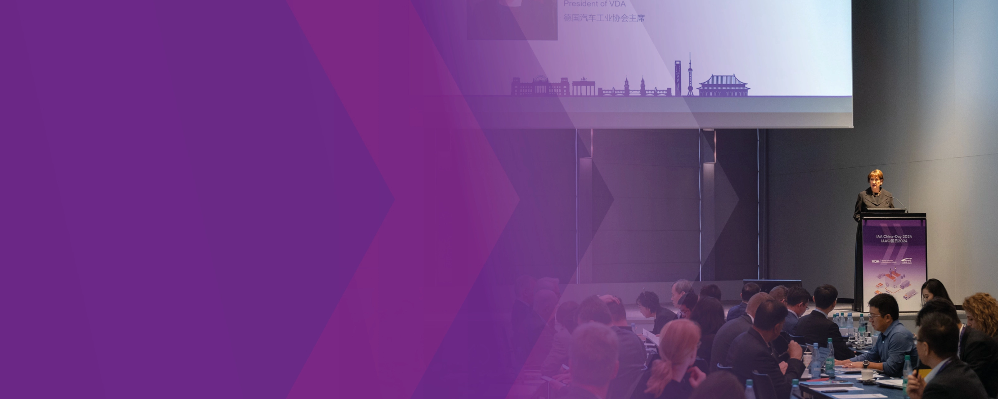 Hildegard Müller speaks at a podium during IAA China Day 2024 conference.