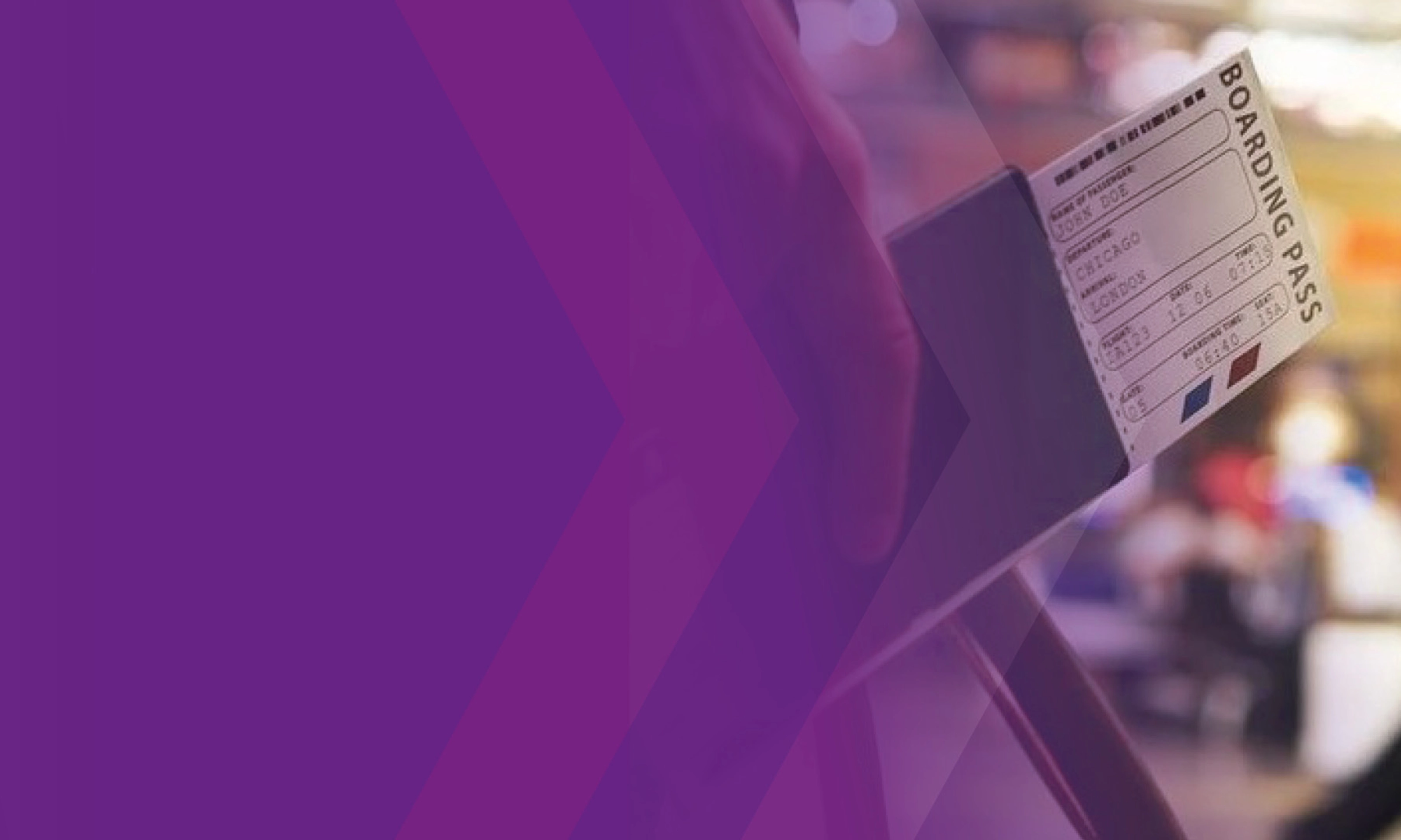 Close-up of a ticket being held at a counter, partly covered by a purple overlay.