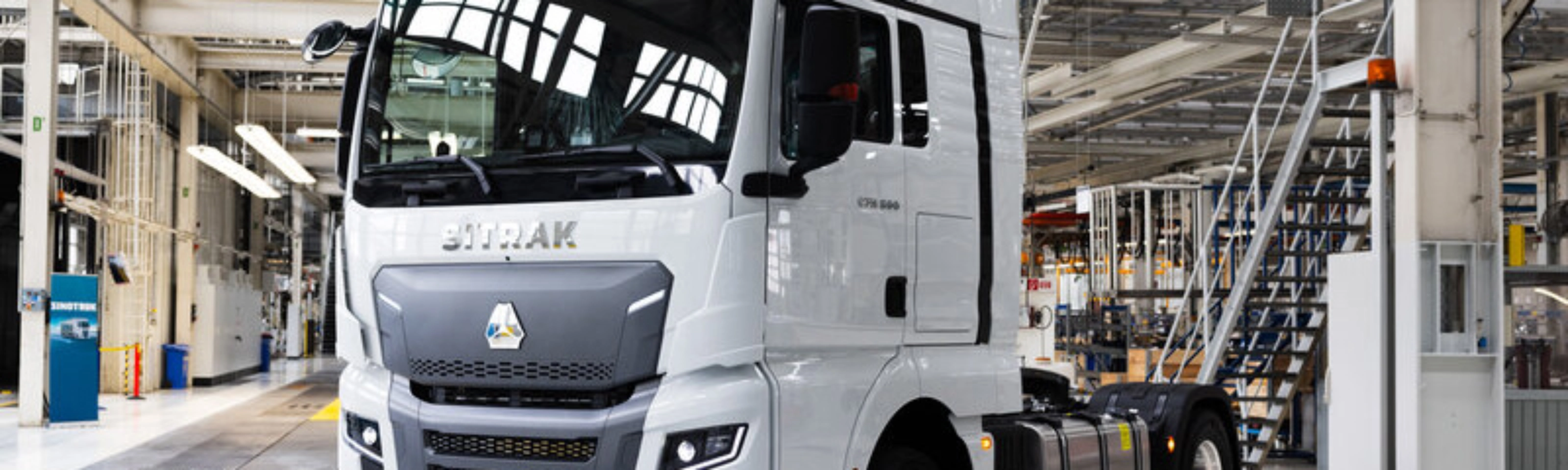 SITRAK truck cab standing inside a modern production hall.