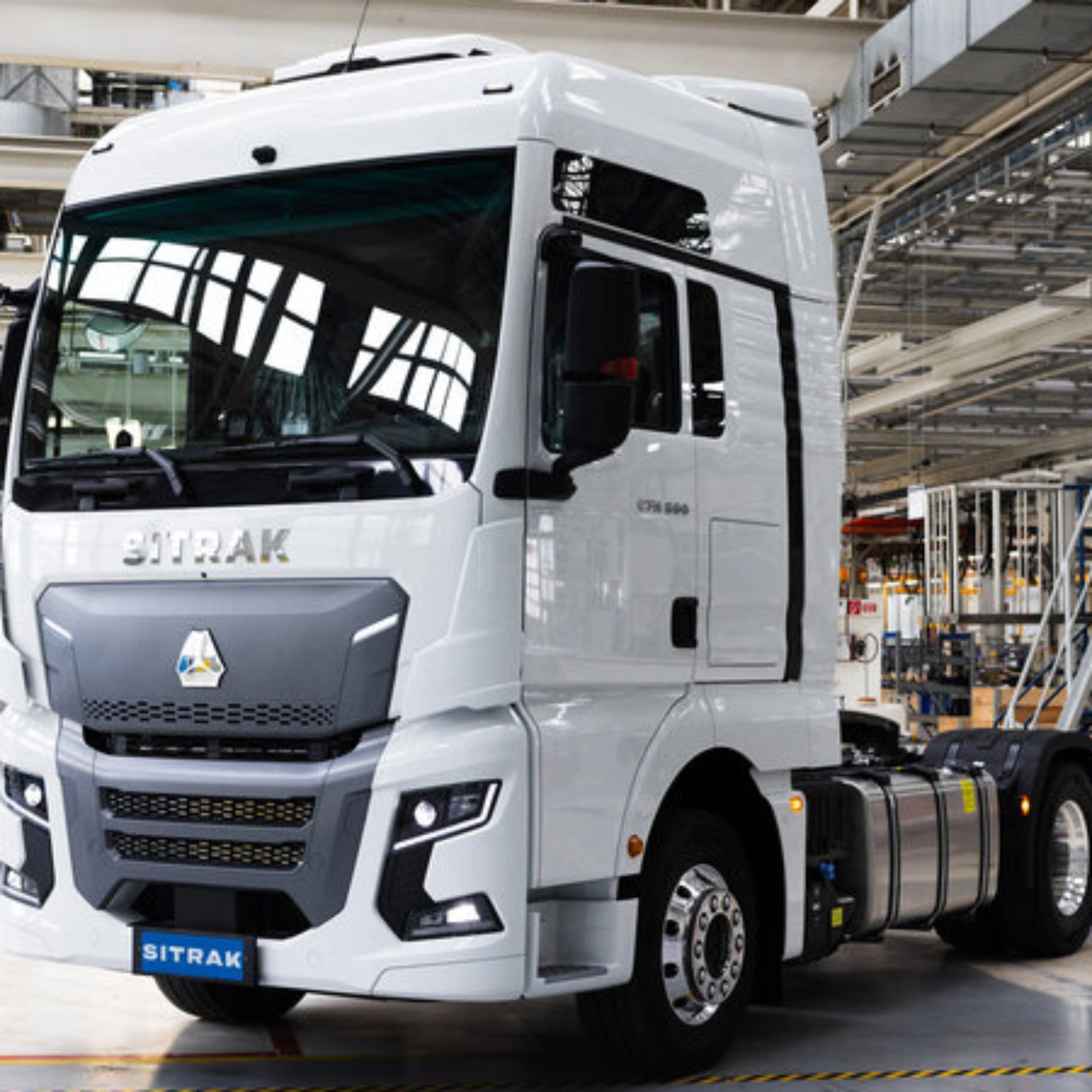 SITRAK truck cab standing inside a modern production hall.