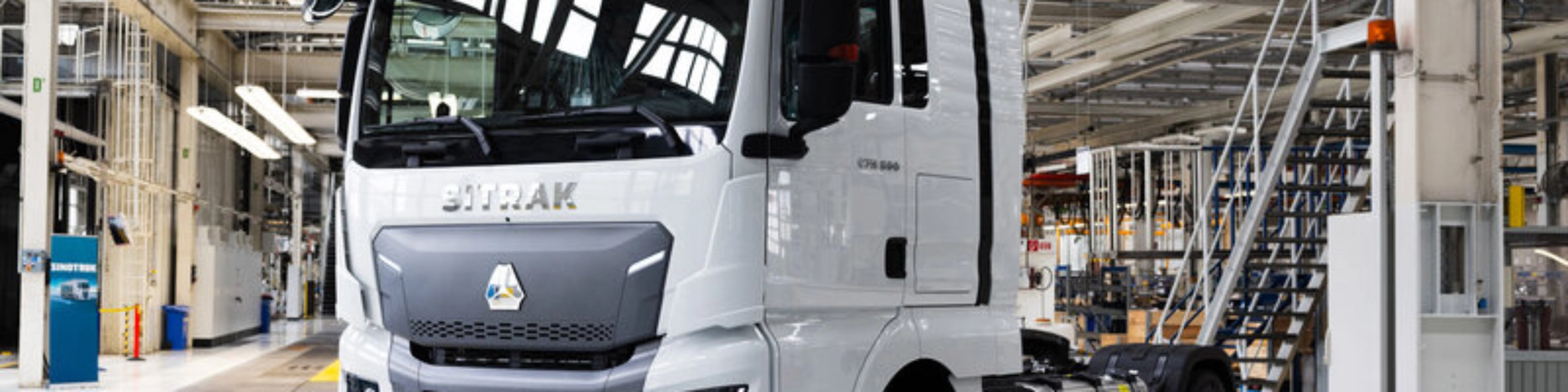 SITRAK truck cab standing inside a modern production hall.