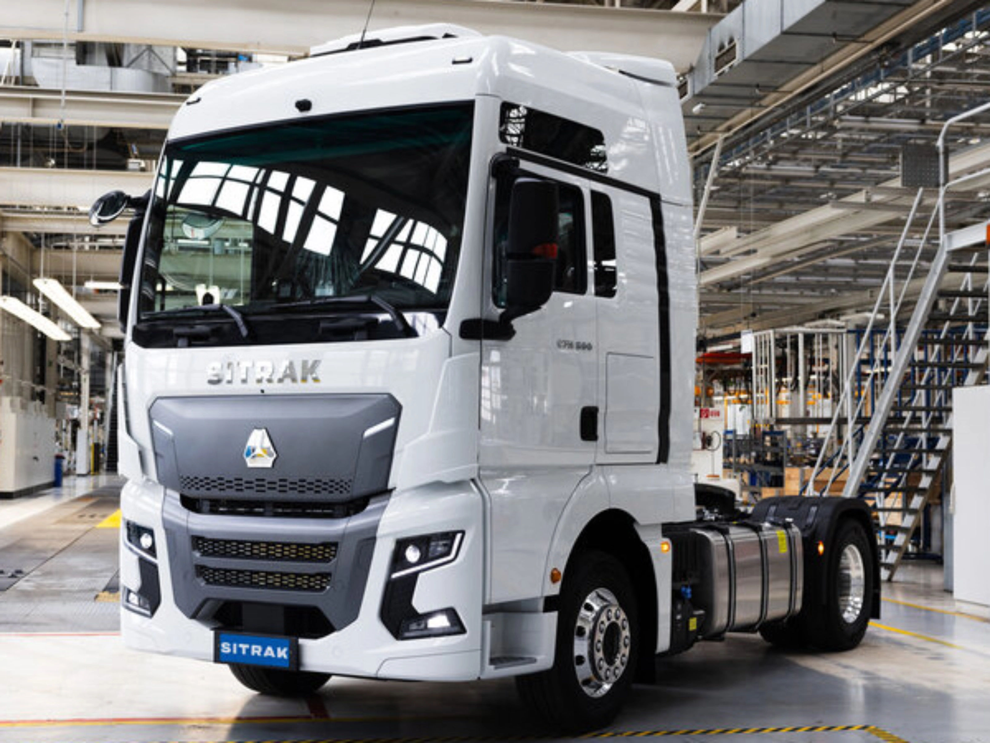 SITRAK truck cab standing inside a modern production hall.