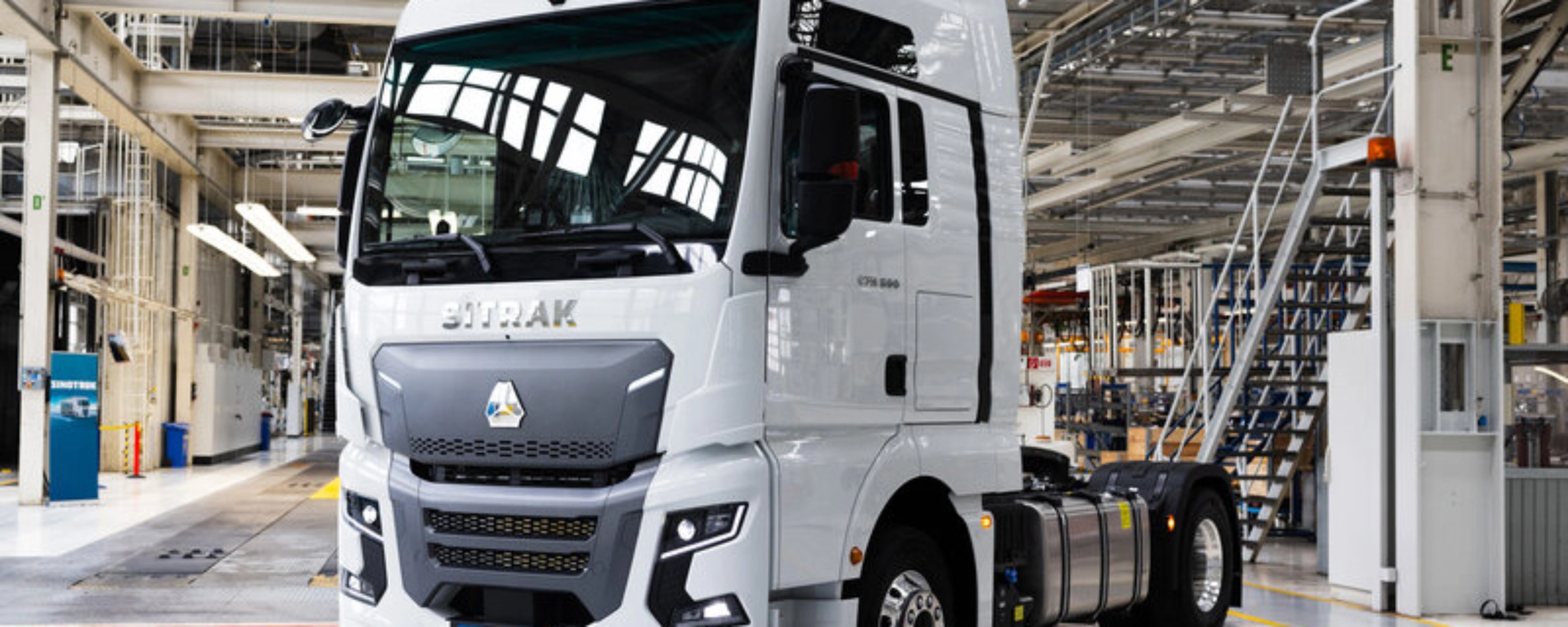 SITRAK truck cab standing inside a modern production hall.