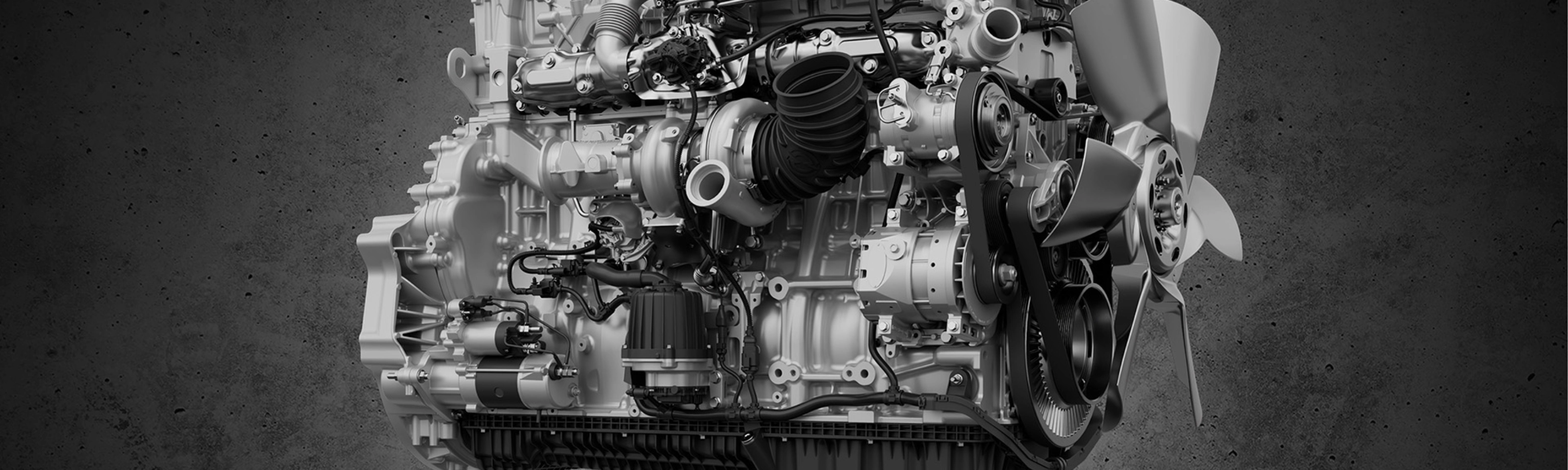 Detailed view of a truck engine with fan and visible components.