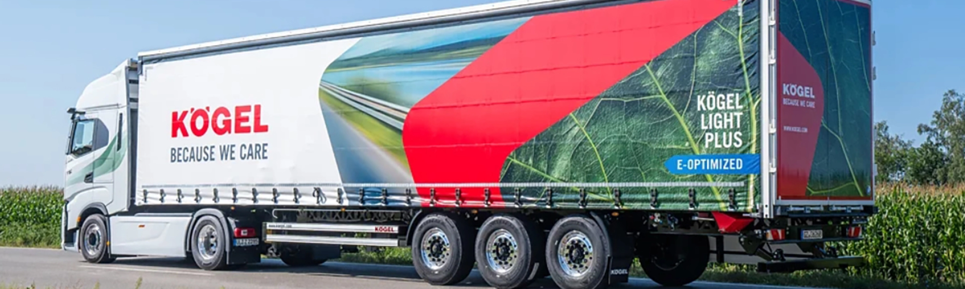 Kögel Light Plus trailer on road with brand logo and eco design.
