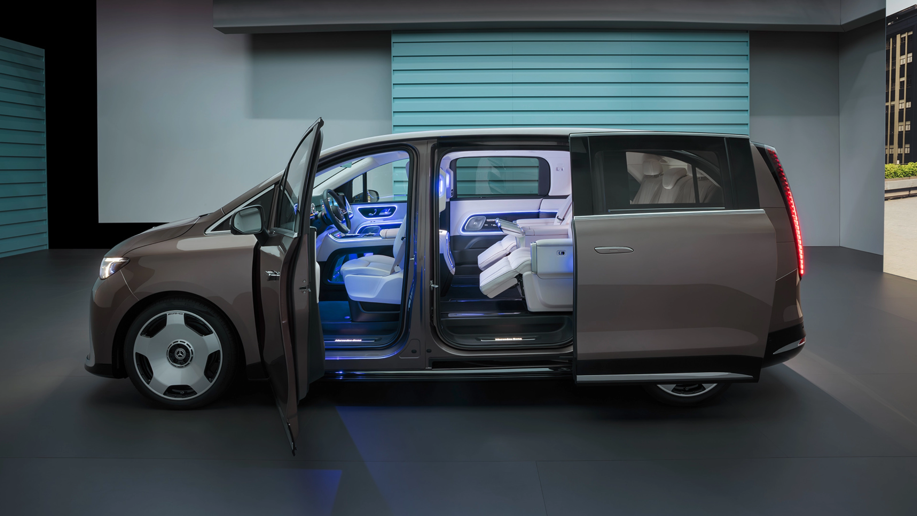 Mercedes-Benz VLE with open sliding door showing interior seats.