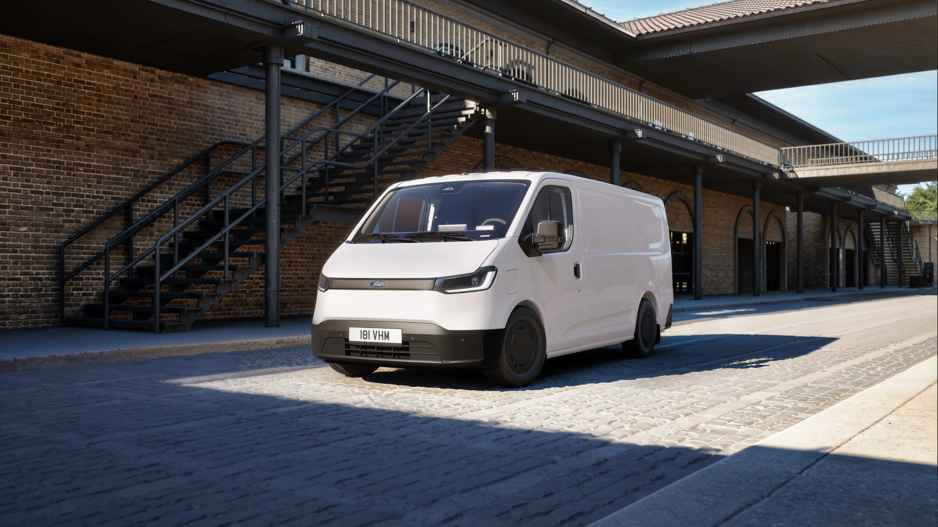 Ford Pro cargo van parked in a courtyard between historic buildings.