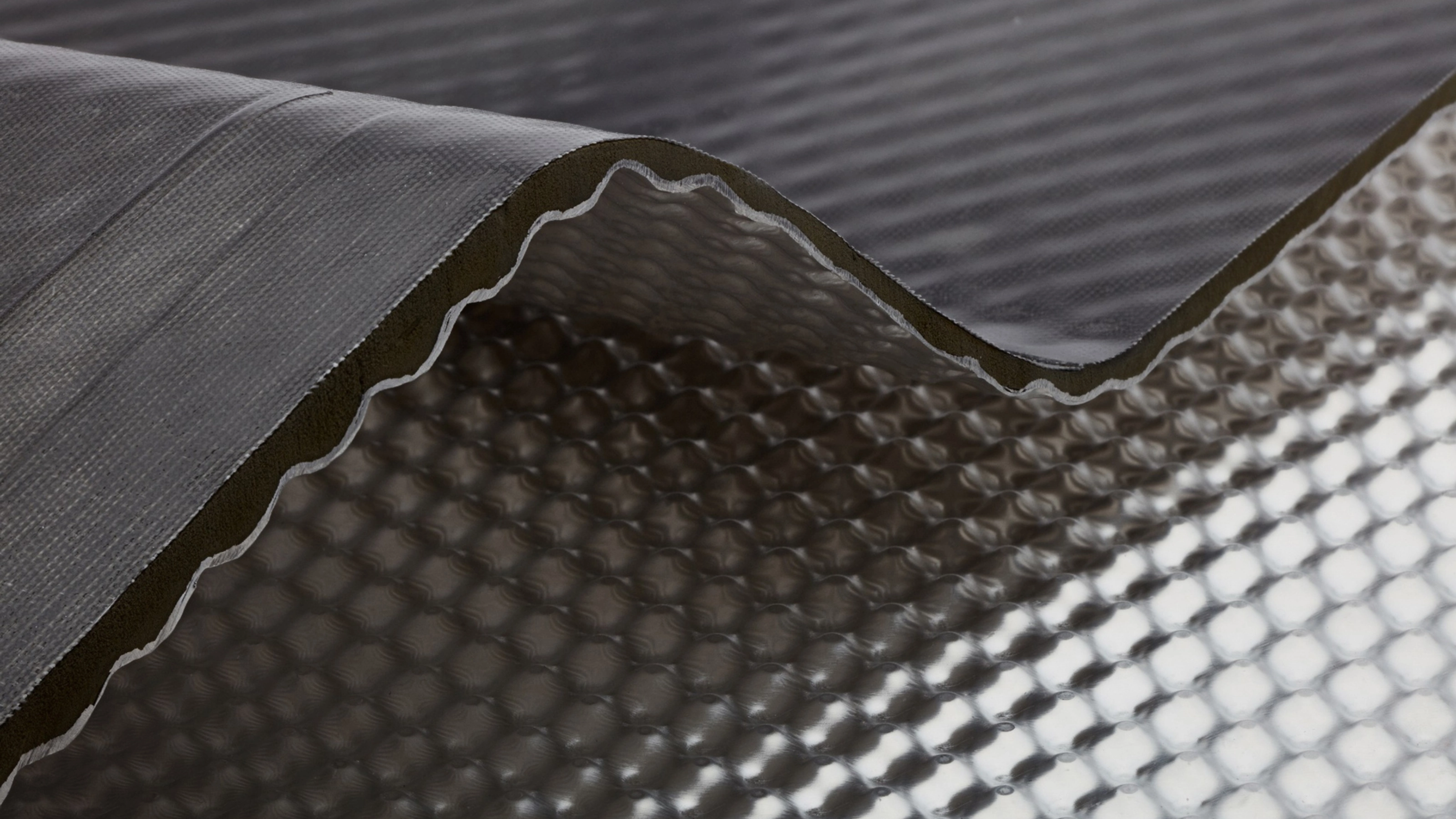 InsituCore composite panel with a textured surface shown in close-up.