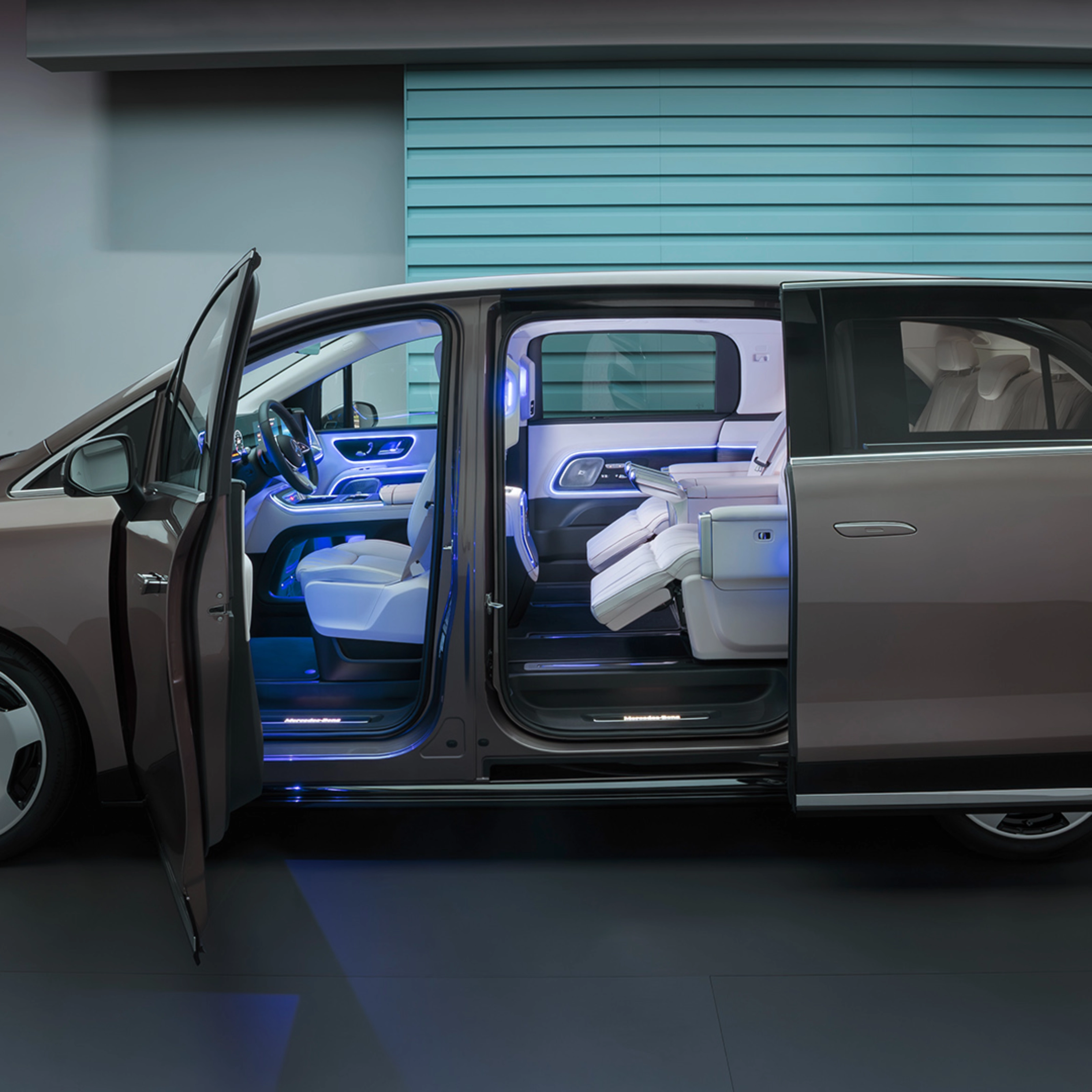 Mercedes-Benz VLE with open sliding door showing interior seats.