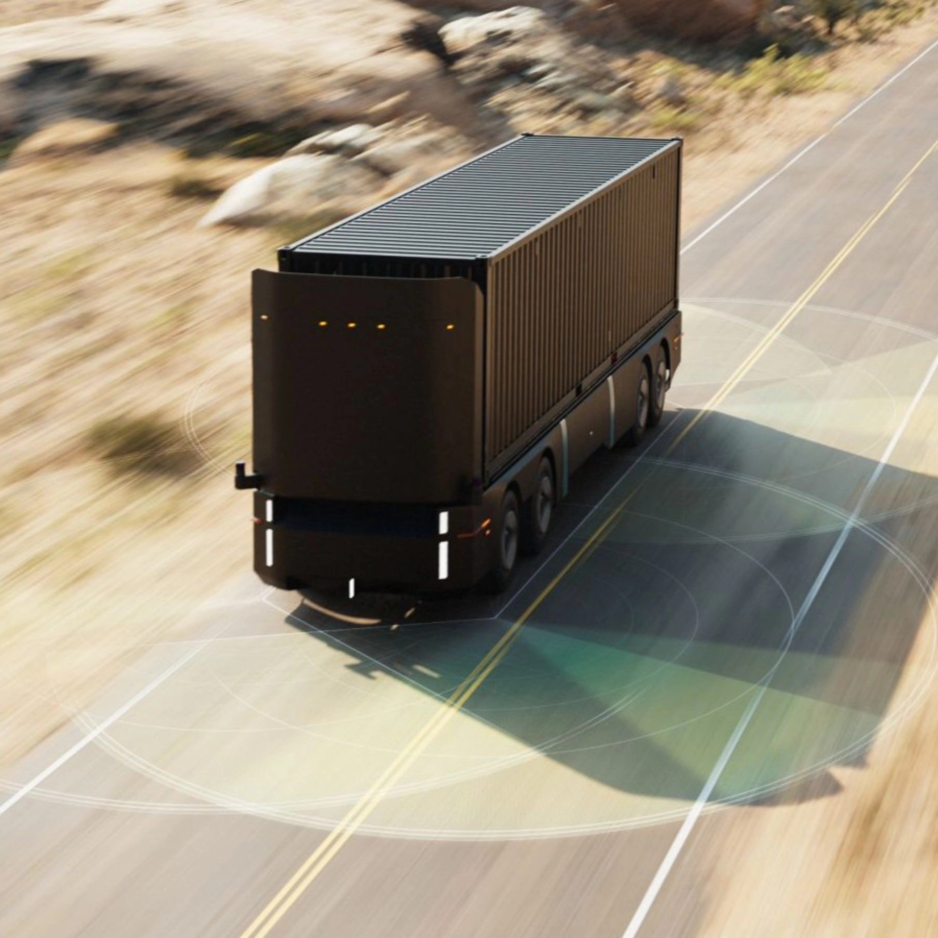Autonomer Elektro-Lkw fährt auf einer Landstraße.