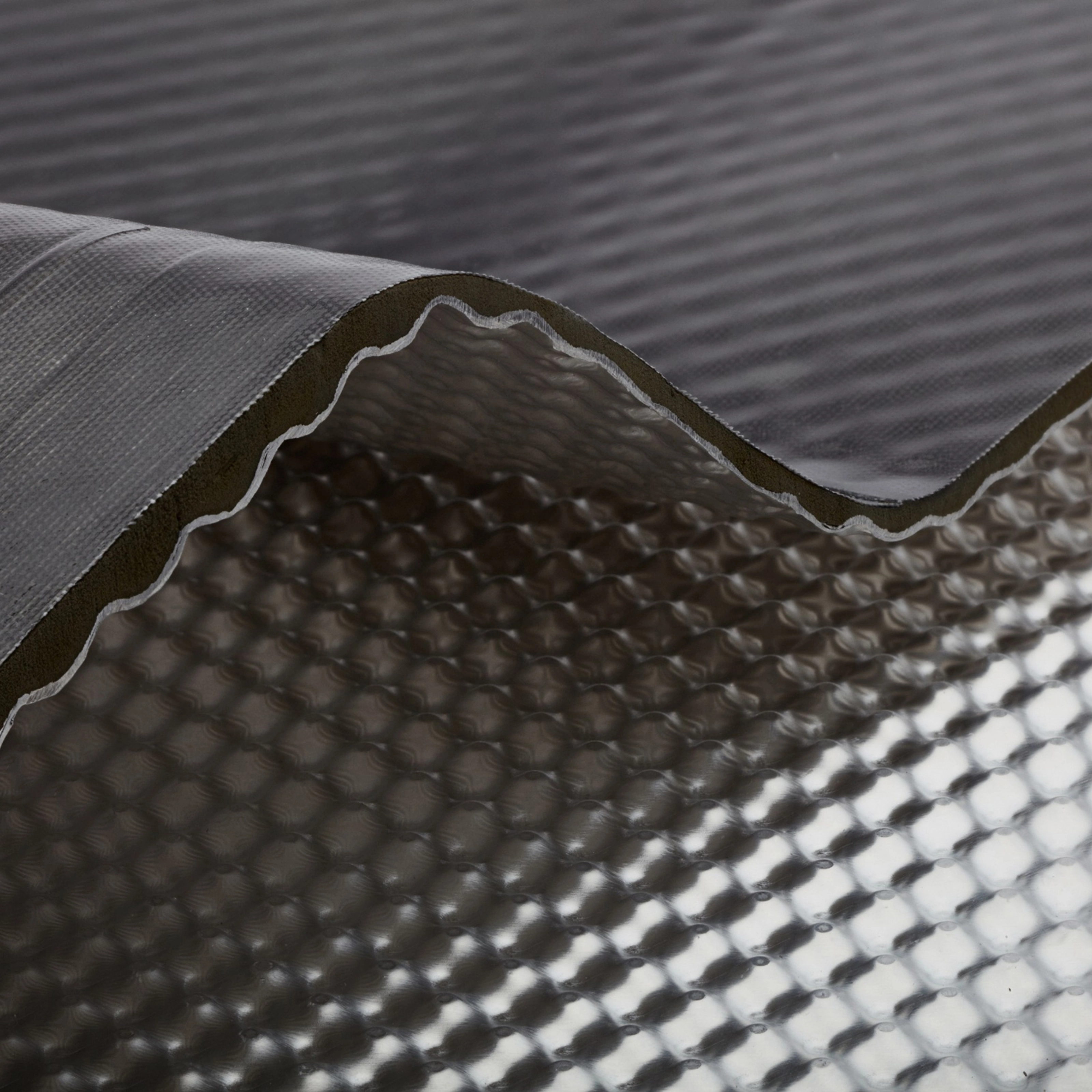 InsituCore composite panel with a textured surface shown in close-up.