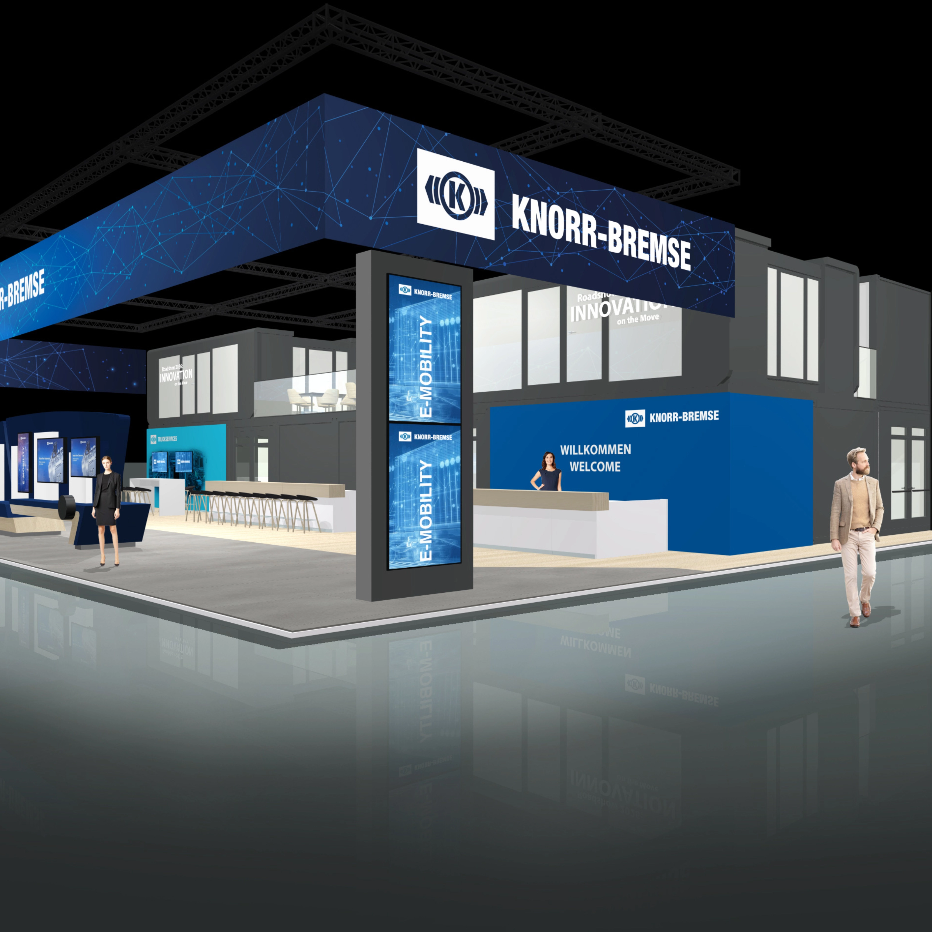 Knorr-Bremse exhibition stand with digital displays and meeting areas at a trade fair.