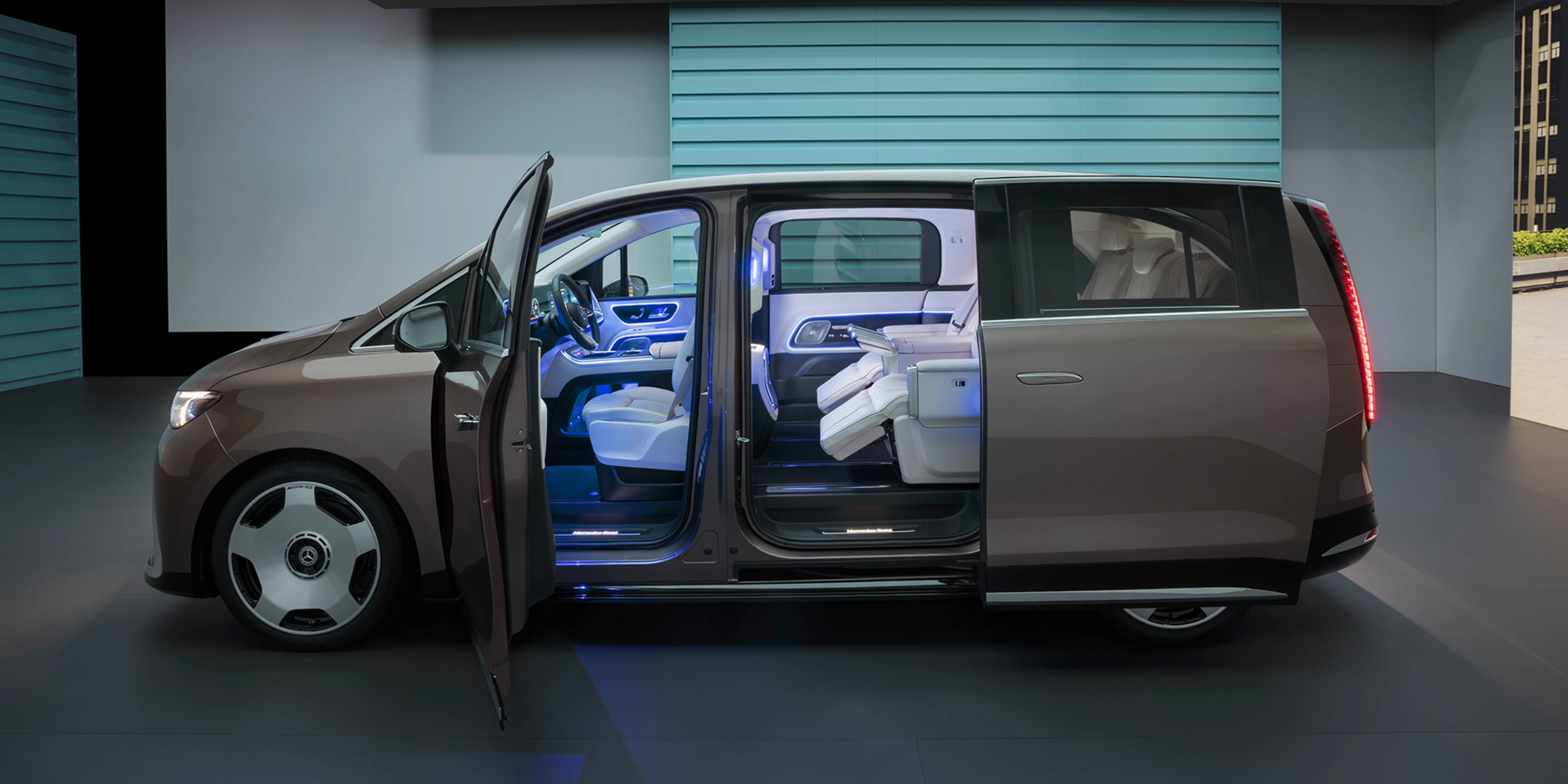 Mercedes-Benz VLE with open sliding door showing interior seats.
