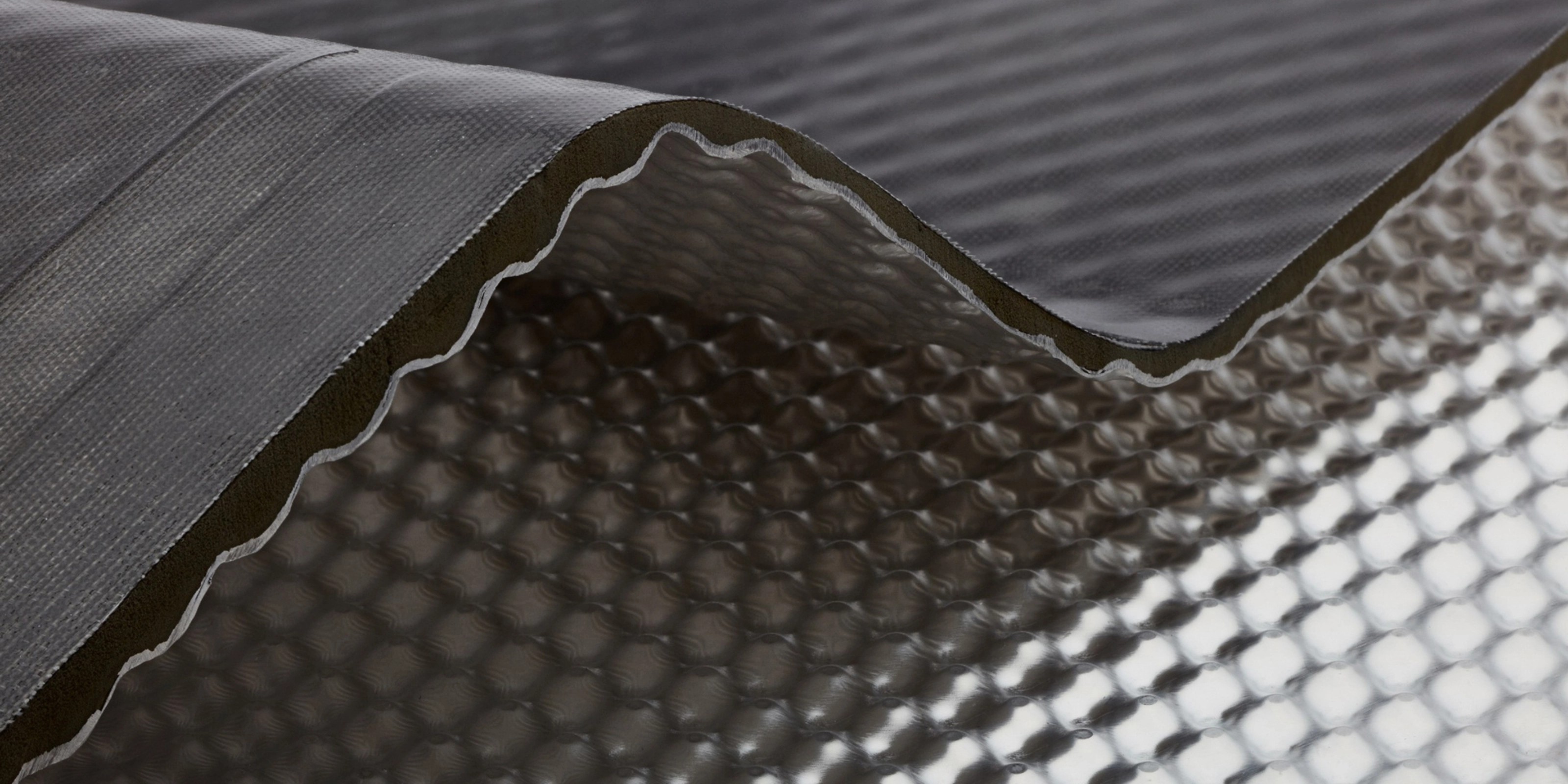 InsituCore composite panel with a textured surface shown in close-up.