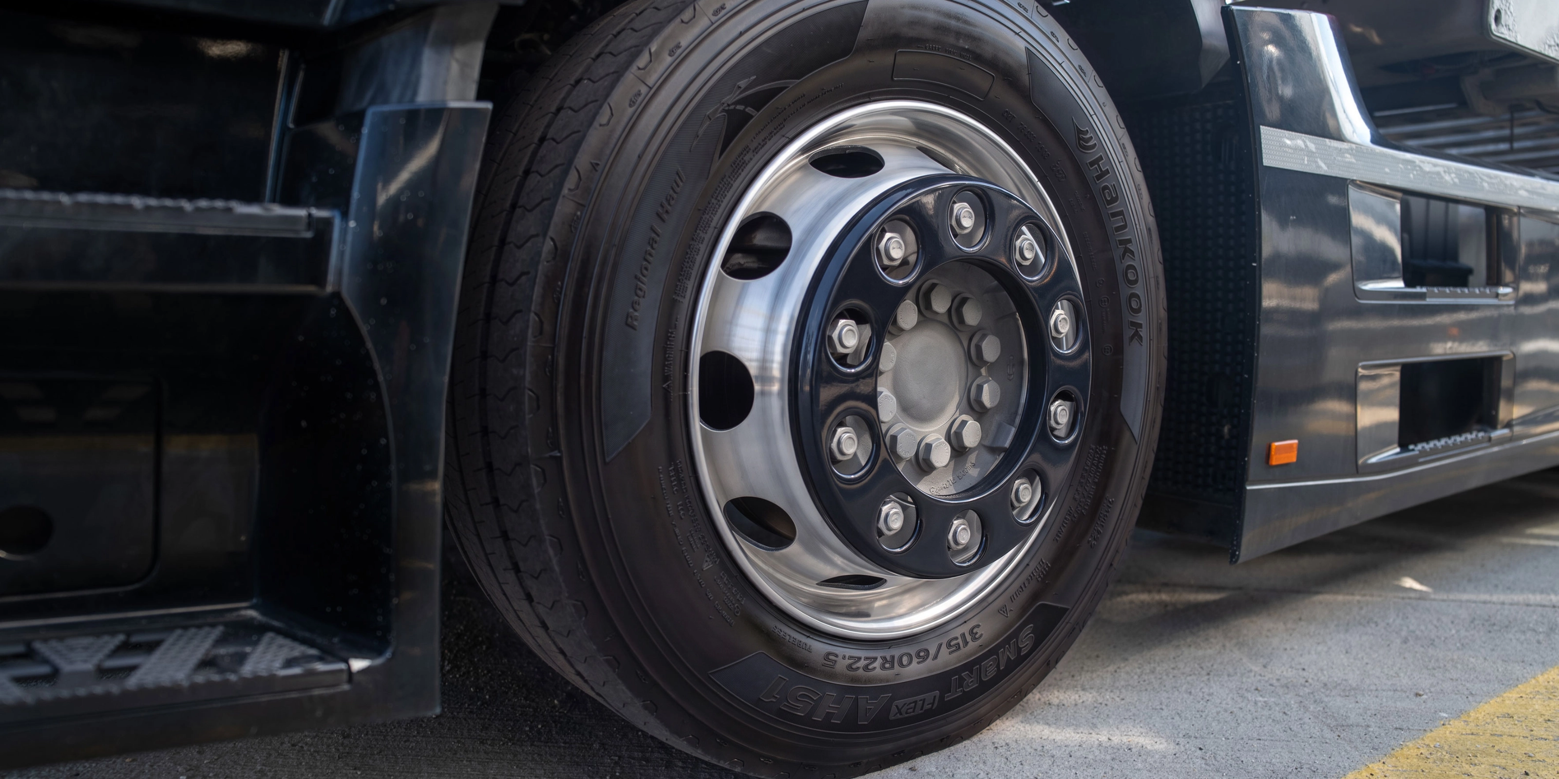 Close-up of a Hankook truck tire mounted on a wheel.