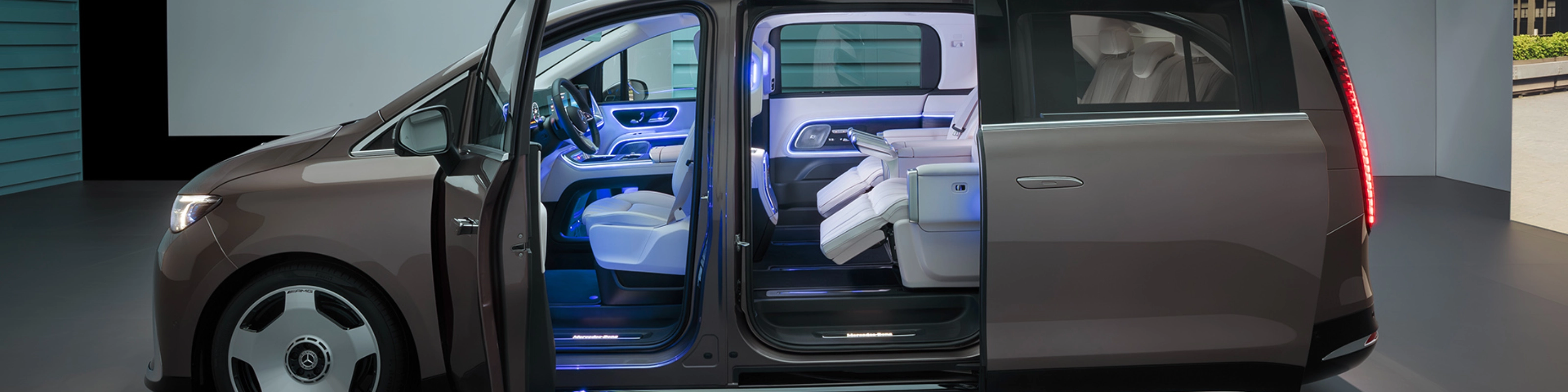 Mercedes-Benz VLE with open sliding door showing interior seats.