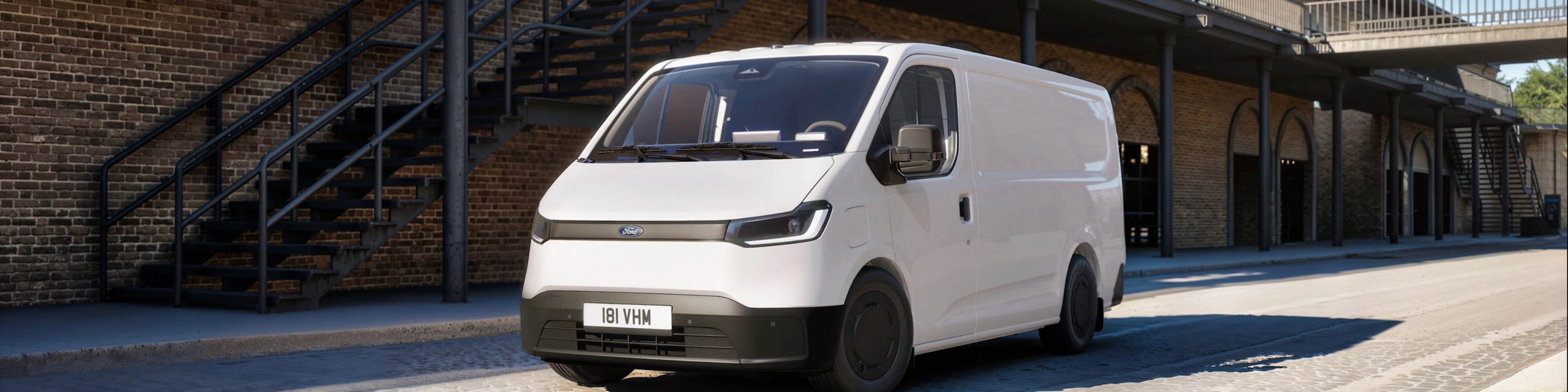 Ford Pro cargo van parked in a courtyard between historic buildings.