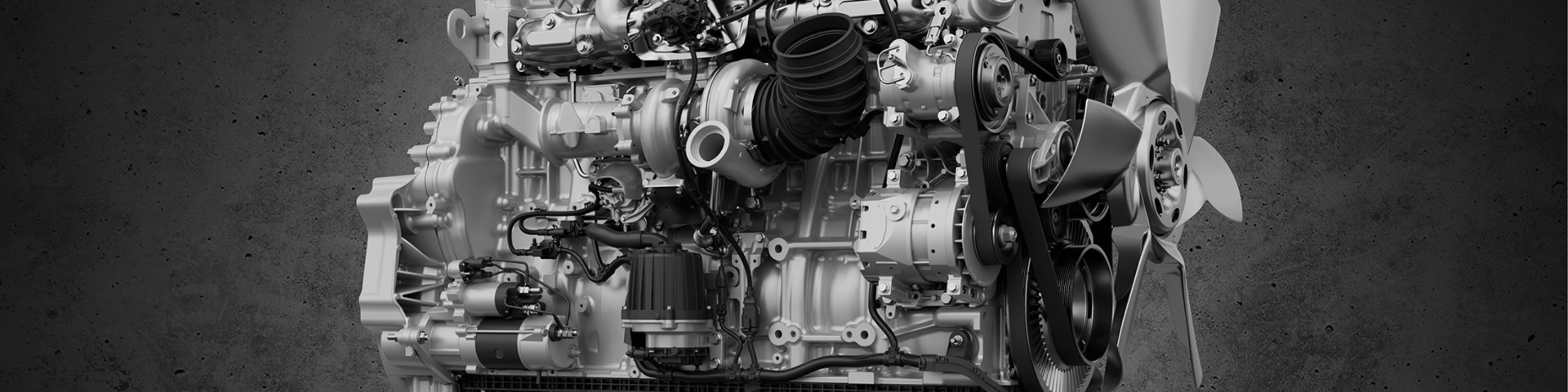 Detailed view of a truck engine with fan and visible components.
