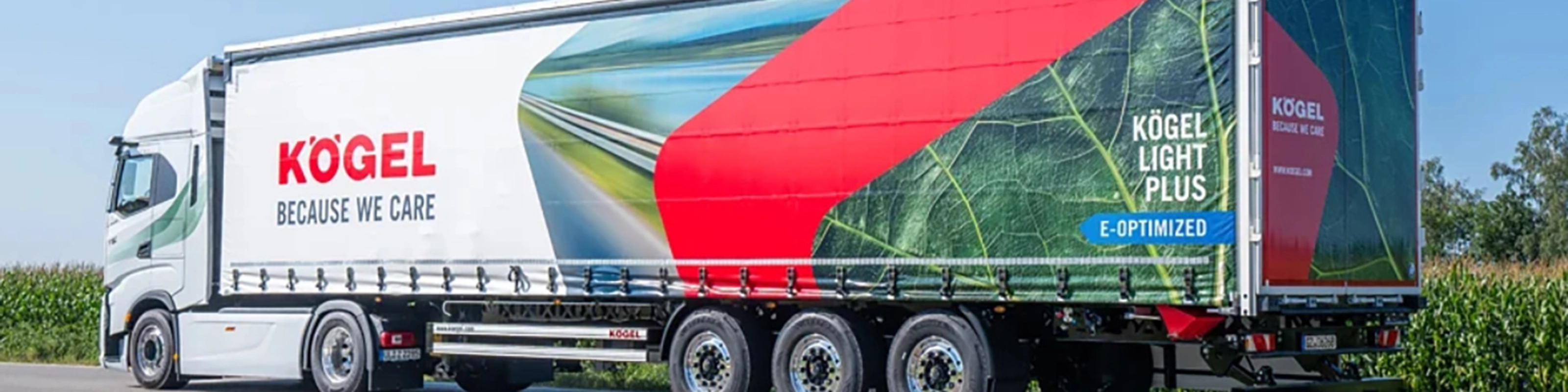 Kögel Light Plus trailer on road with brand logo and eco design.