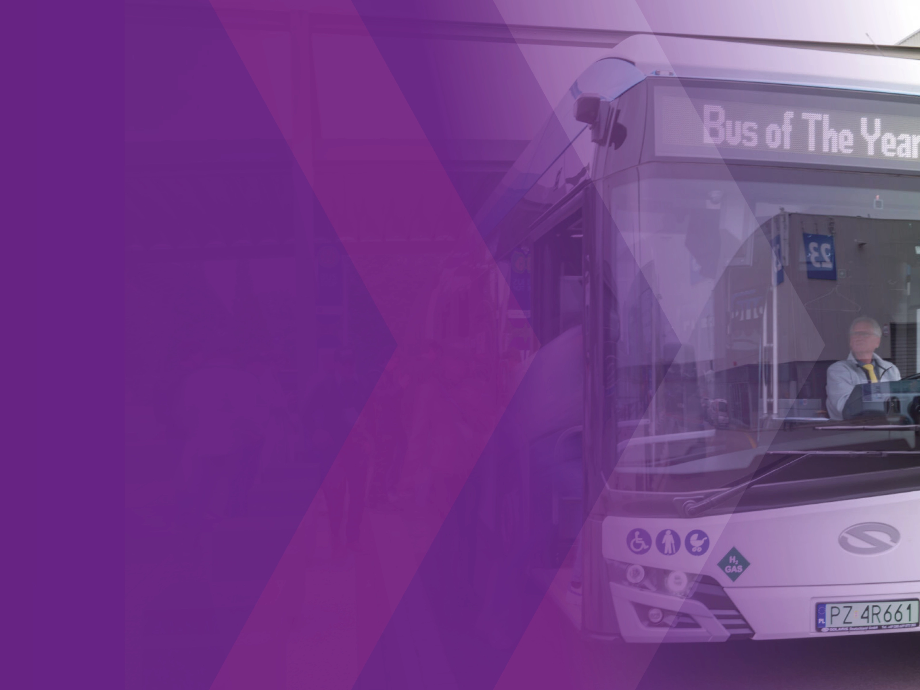 Bus with driver and display reading “Bus of The Year 2025”.