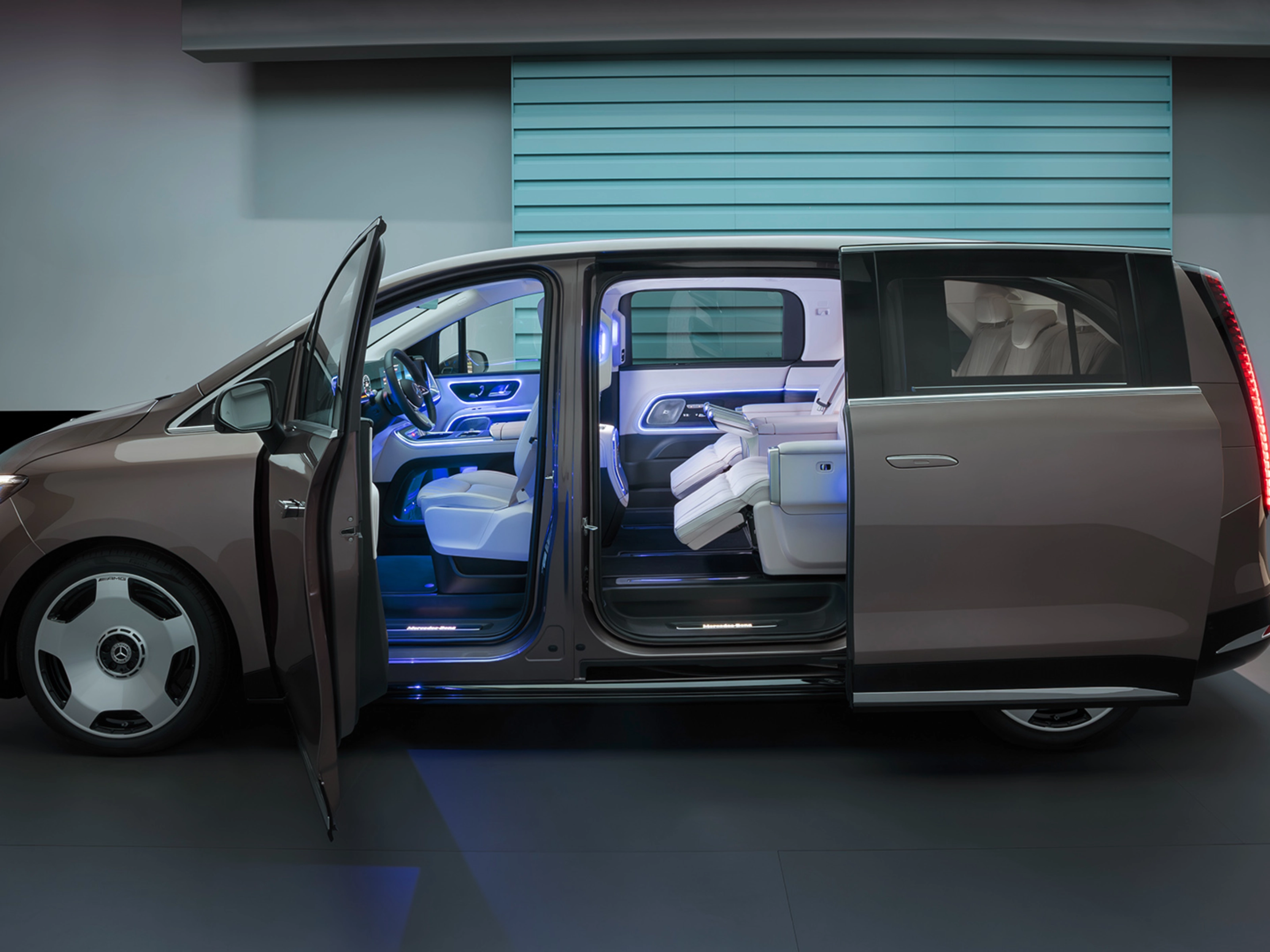 Mercedes-Benz VLE with open sliding door showing interior seats.