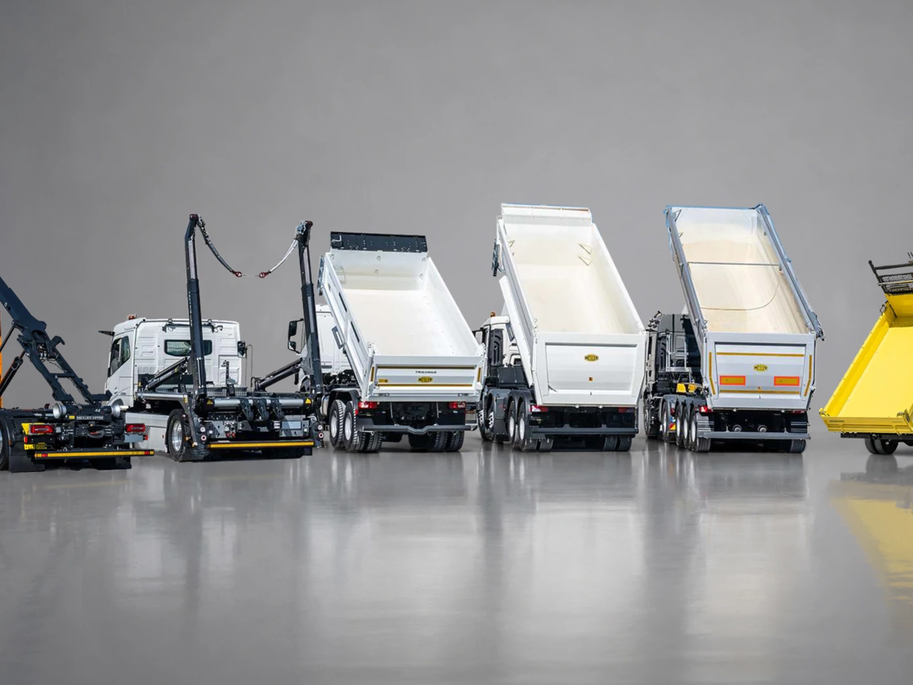 Meiller lineup of truck bodies and tipping systems on a white background.