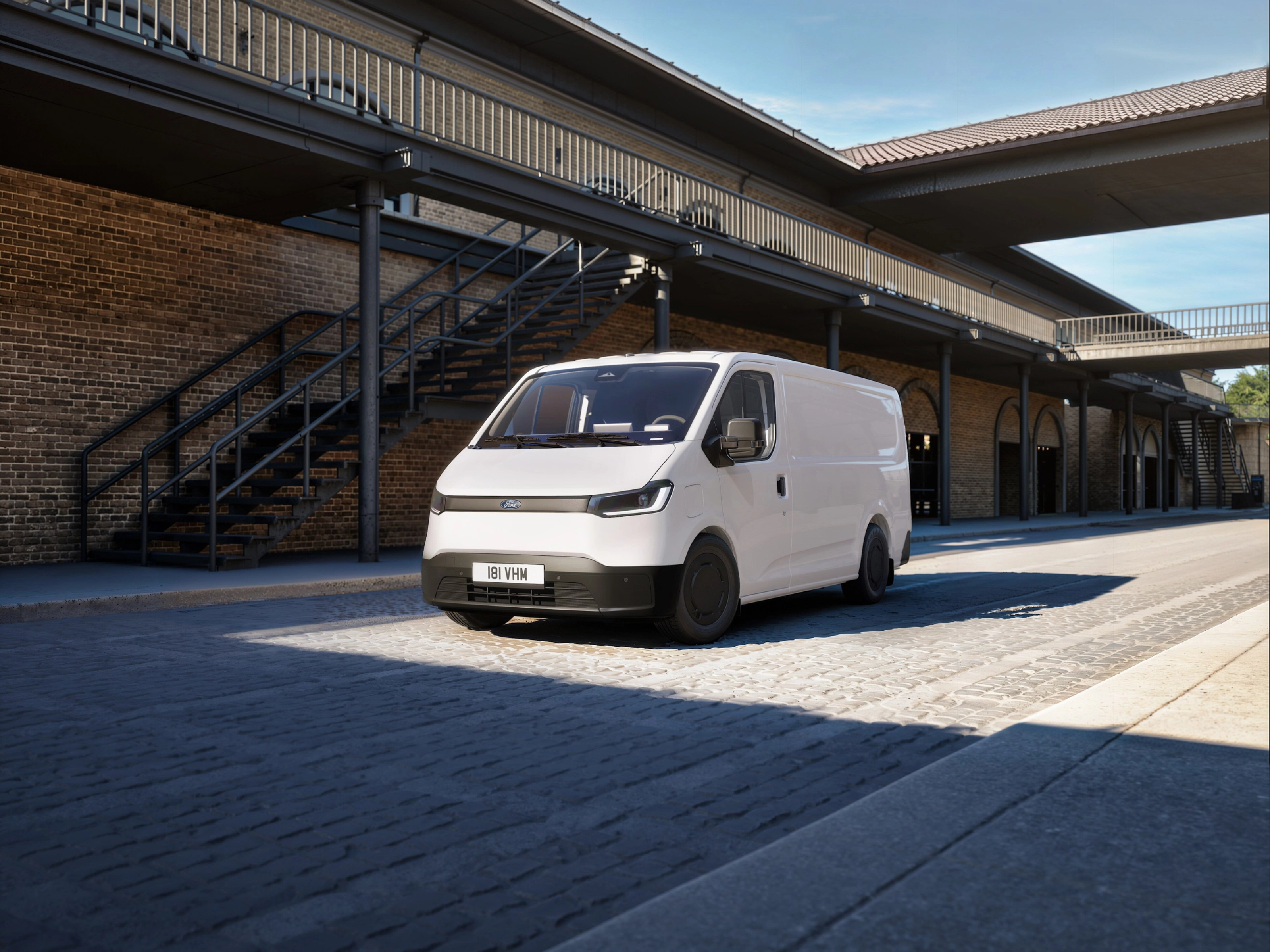 Ford Pro cargo van parked in a courtyard between historic buildings.