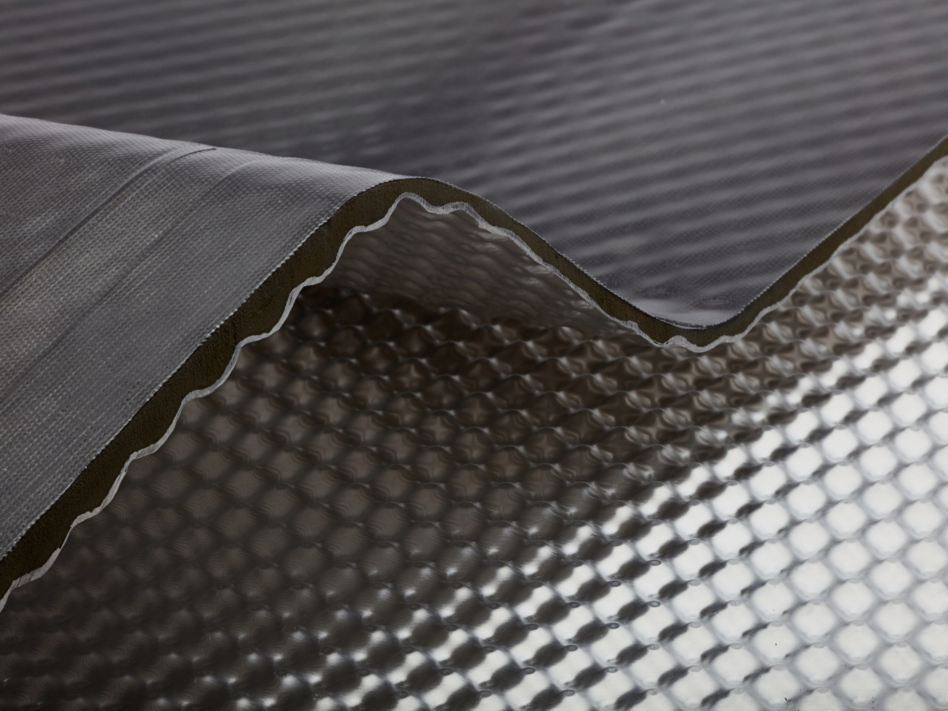 InsituCore composite panel with a textured surface shown in close-up.