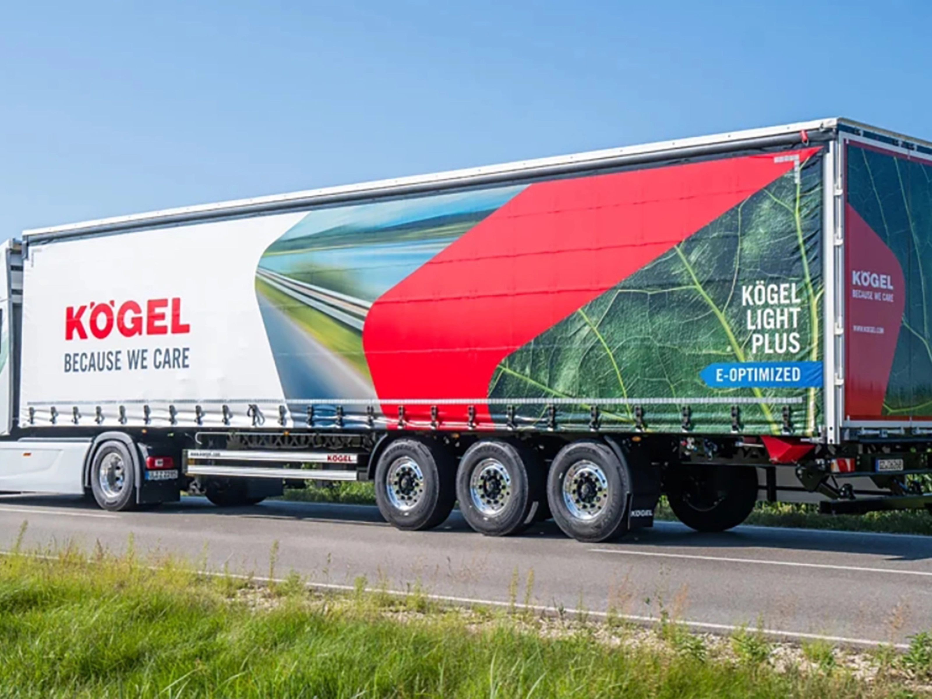Kögel Light Plus trailer on road with brand logo and eco design.