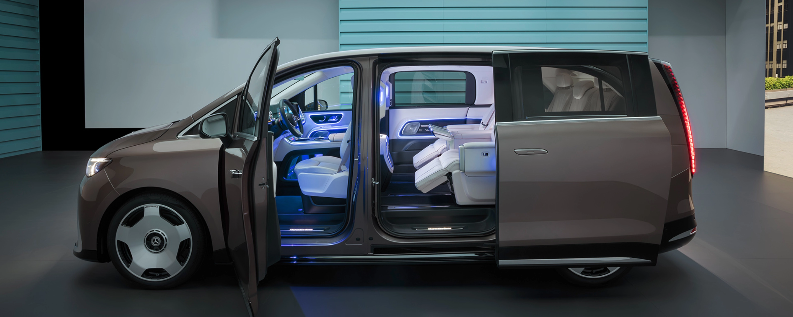 Mercedes-Benz VLE with open sliding door showing interior seats.