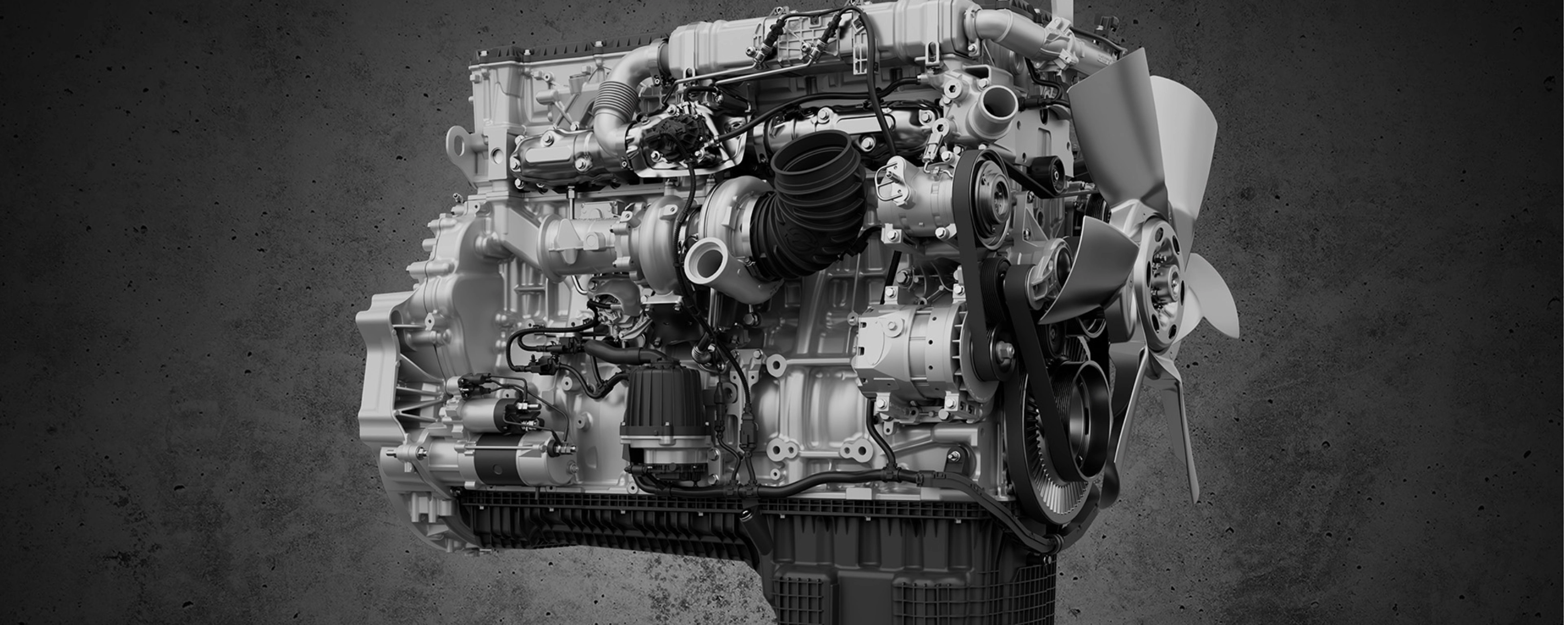 Detailed view of a truck engine with fan and visible components.
