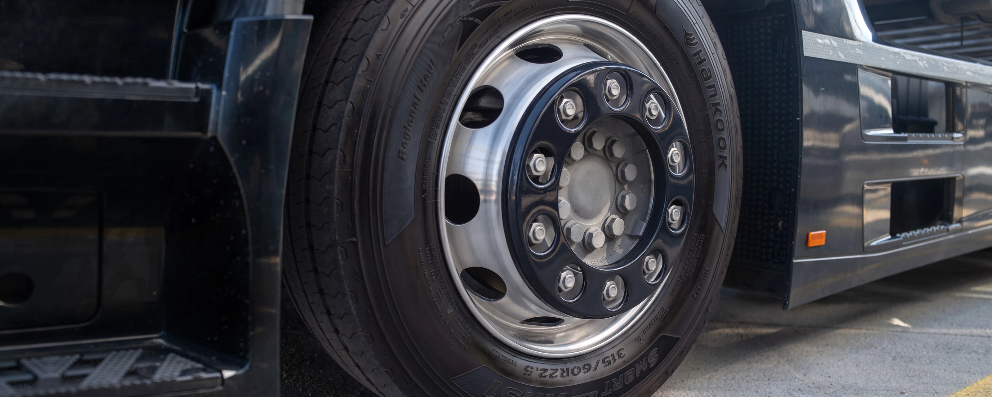 Close-up of a Hankook truck tire mounted on a wheel.